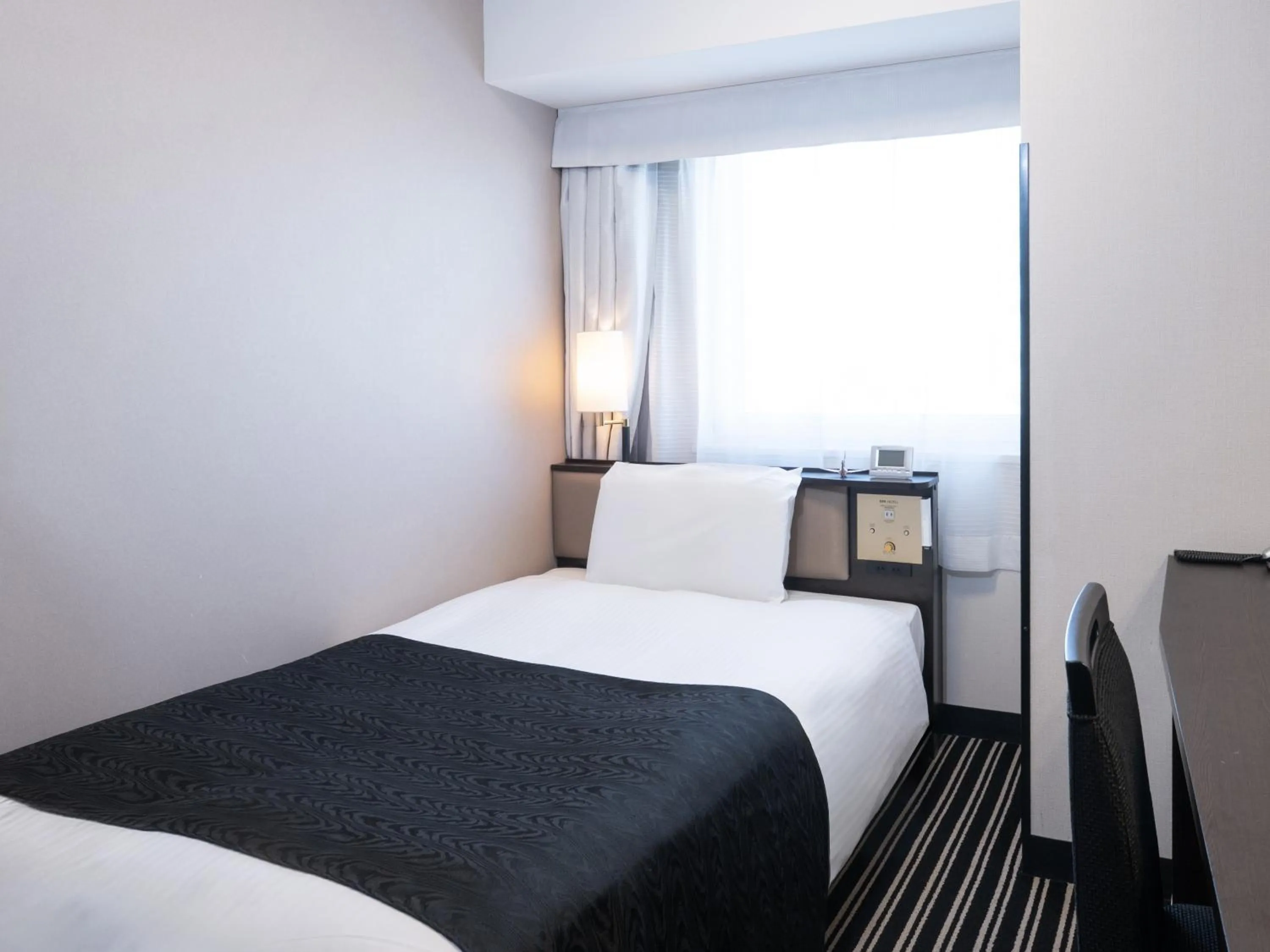 Bed in APA Hotel Shinjuku Kabukicho Tower