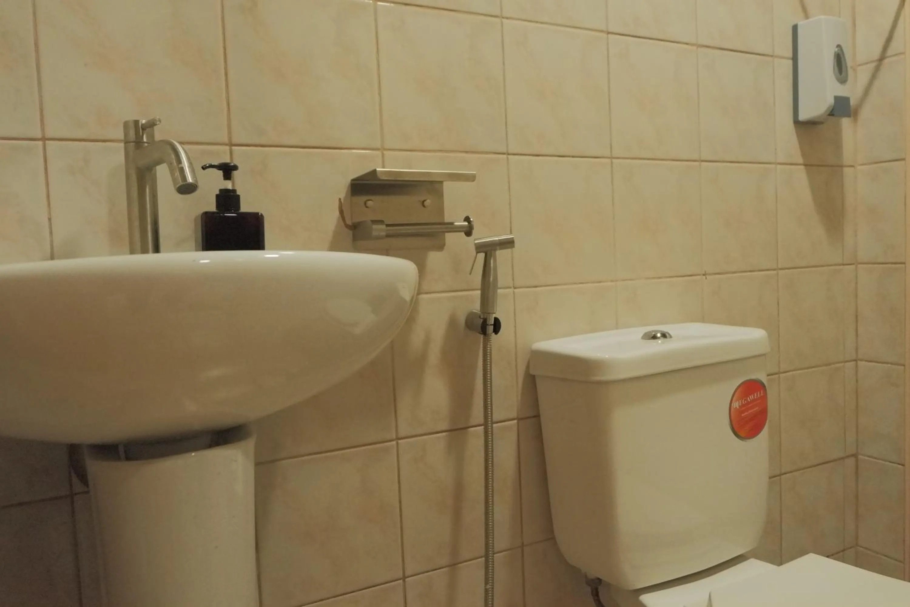 Toilet in Brightwood Hotel & Residences