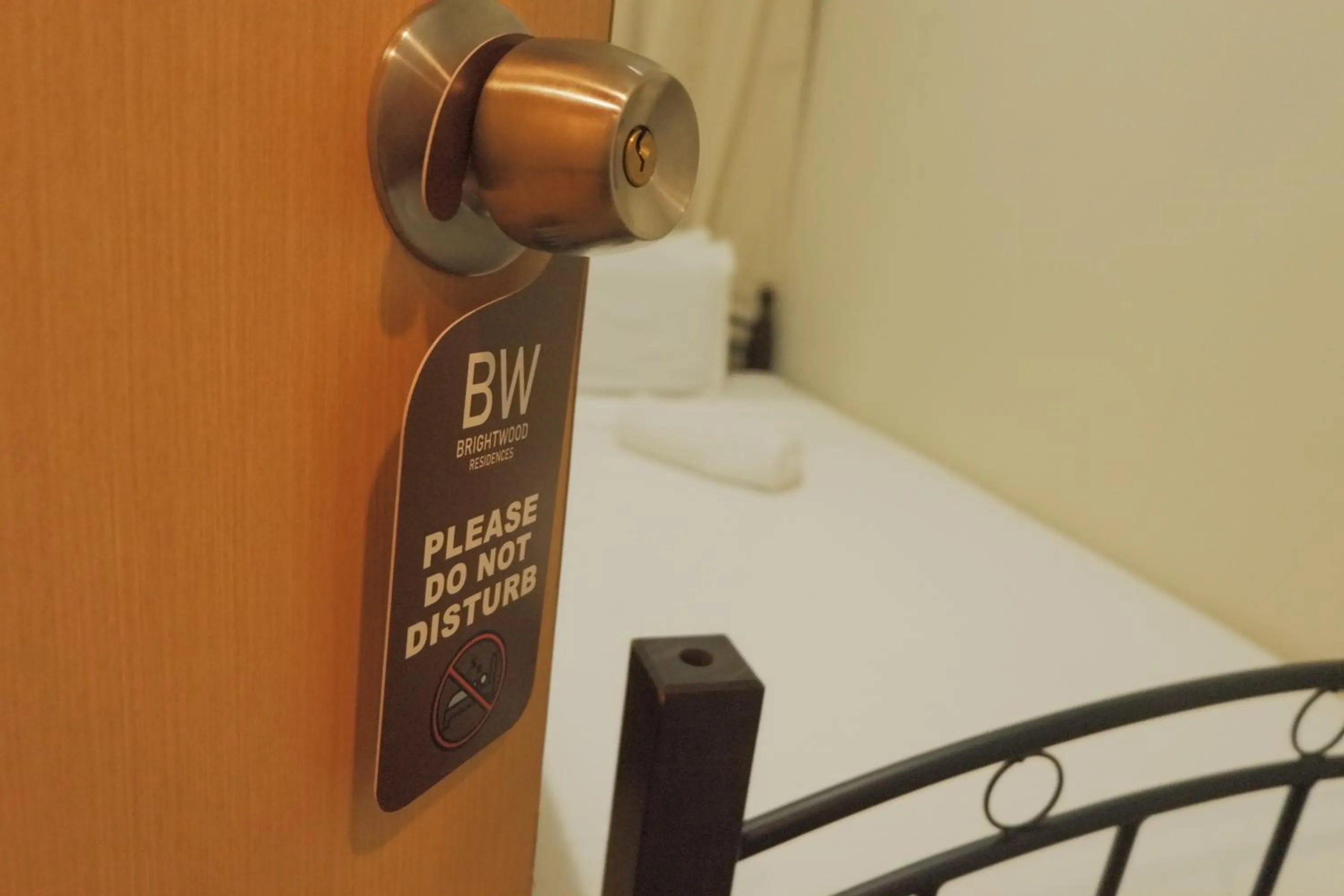 Bed in Brightwood Hotel & Residences