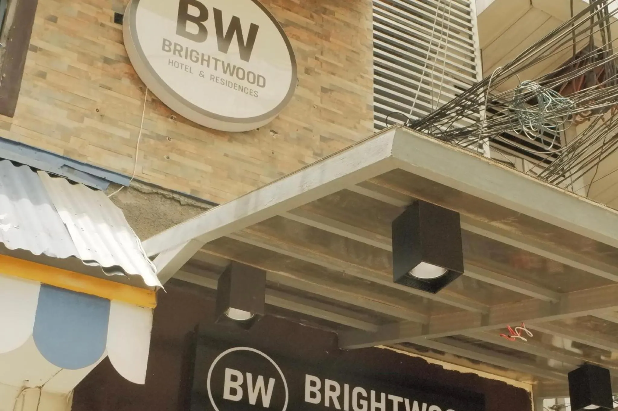 Property logo or sign in Brightwood Hotel & Residences