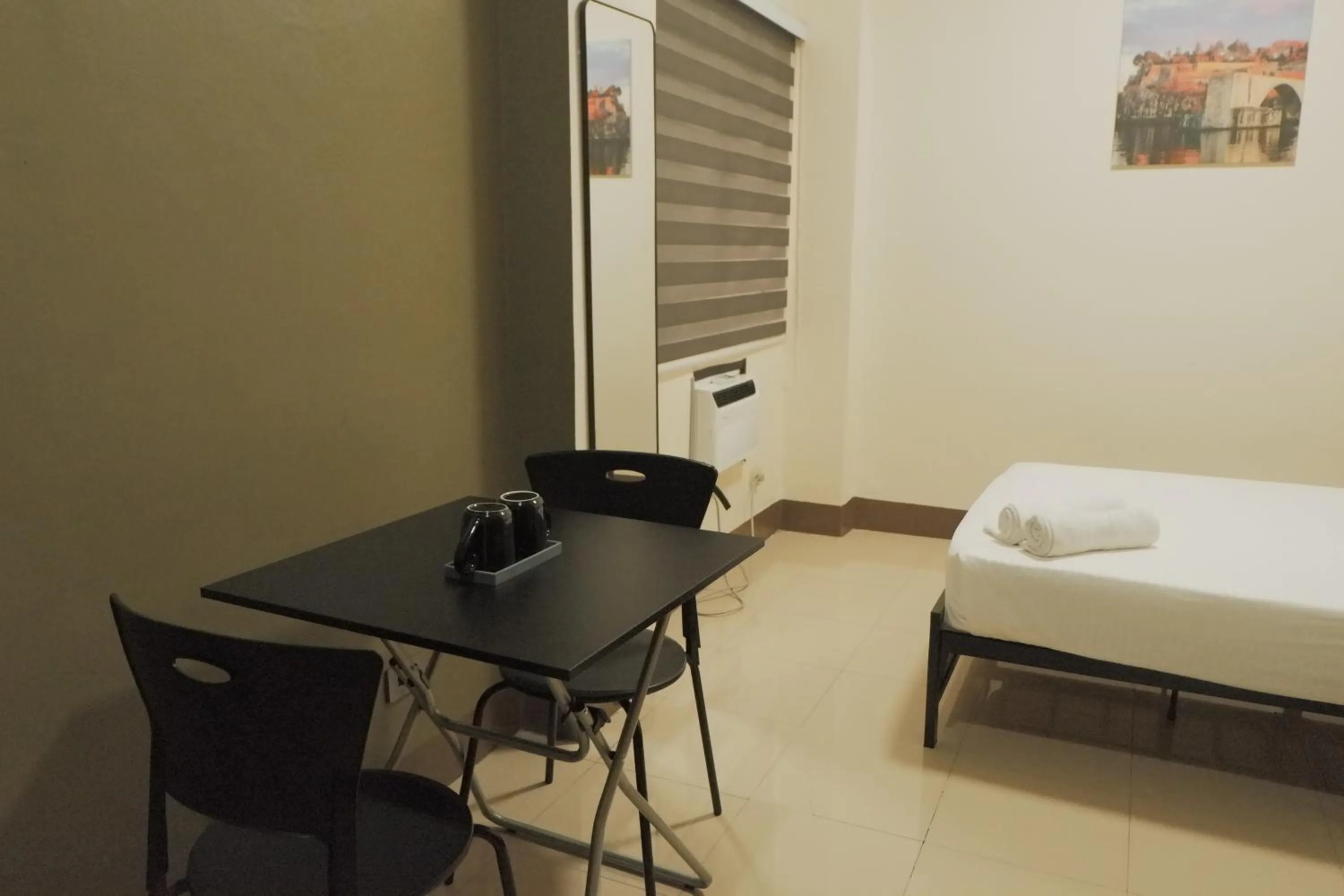 Bed in Brightwood Hotel & Residences