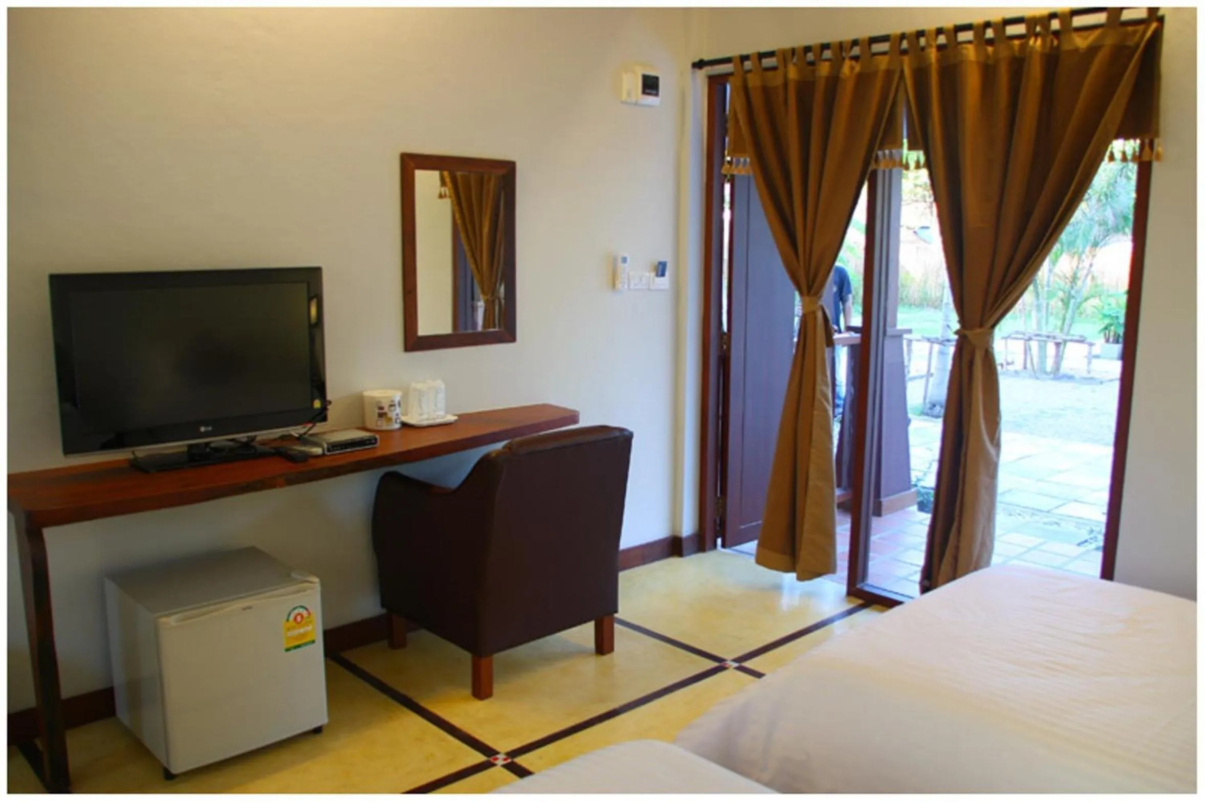 Bed in The Myhome Resort