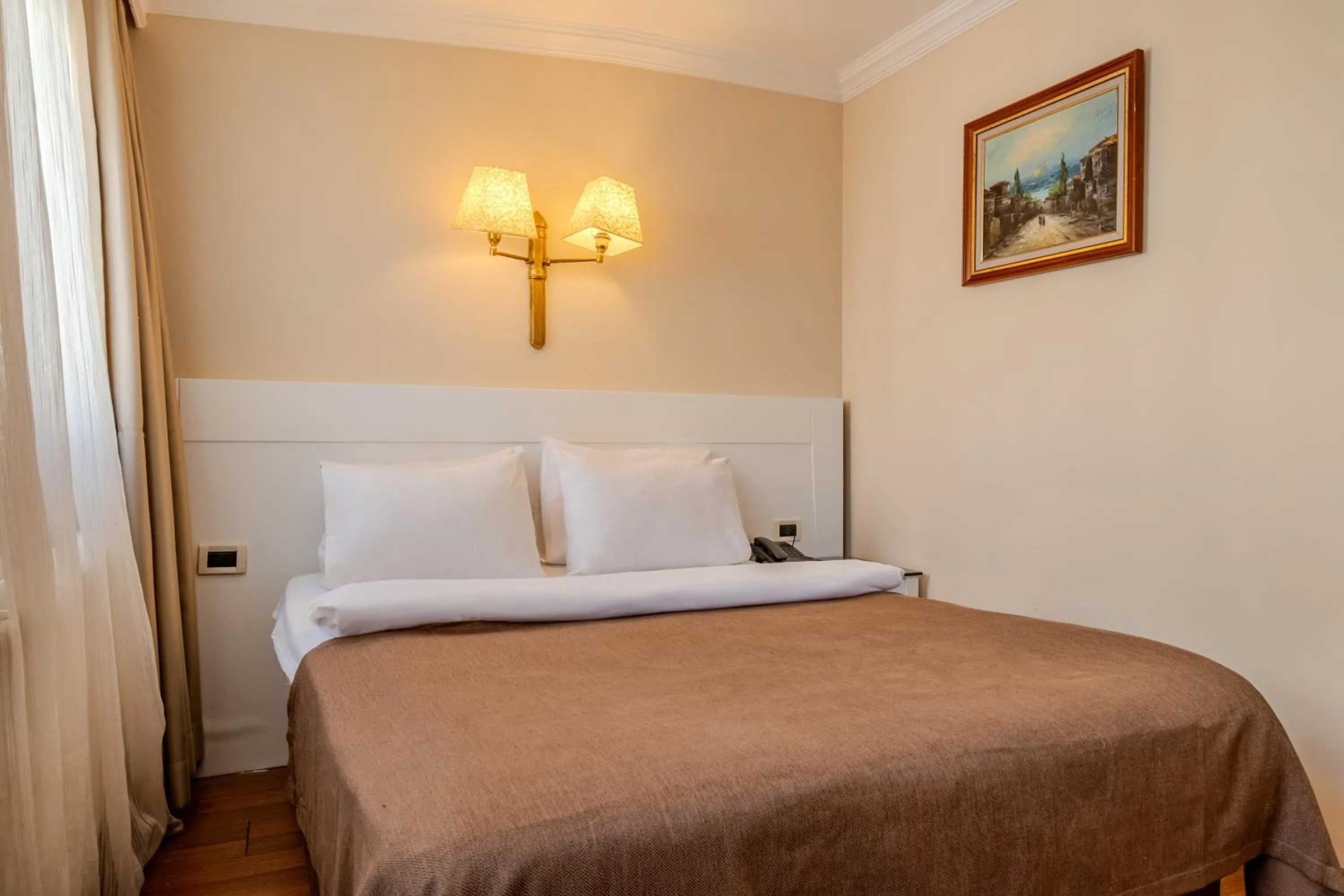 Bed in Peak Star Hotel