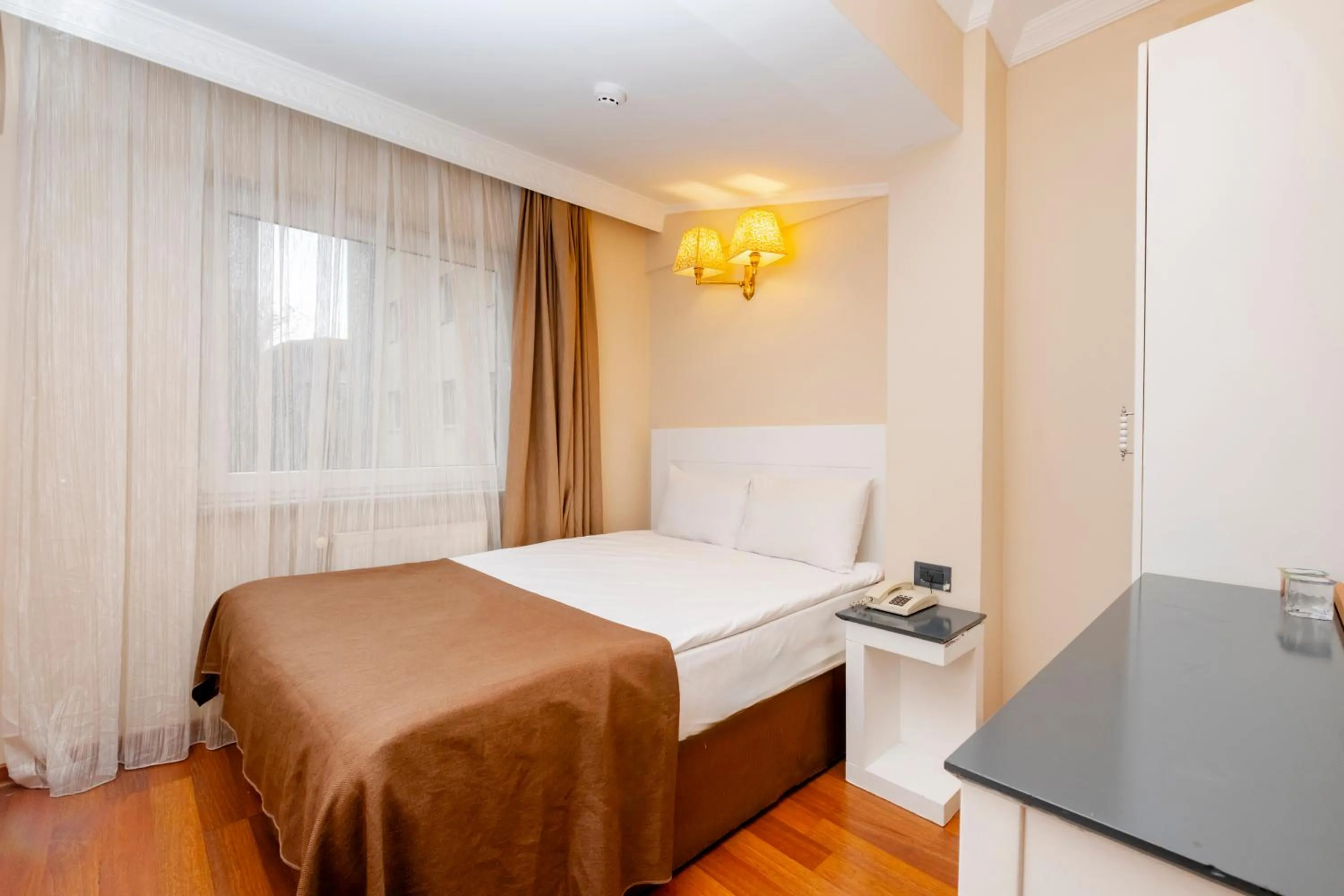 Bed in Peak Star Hotel