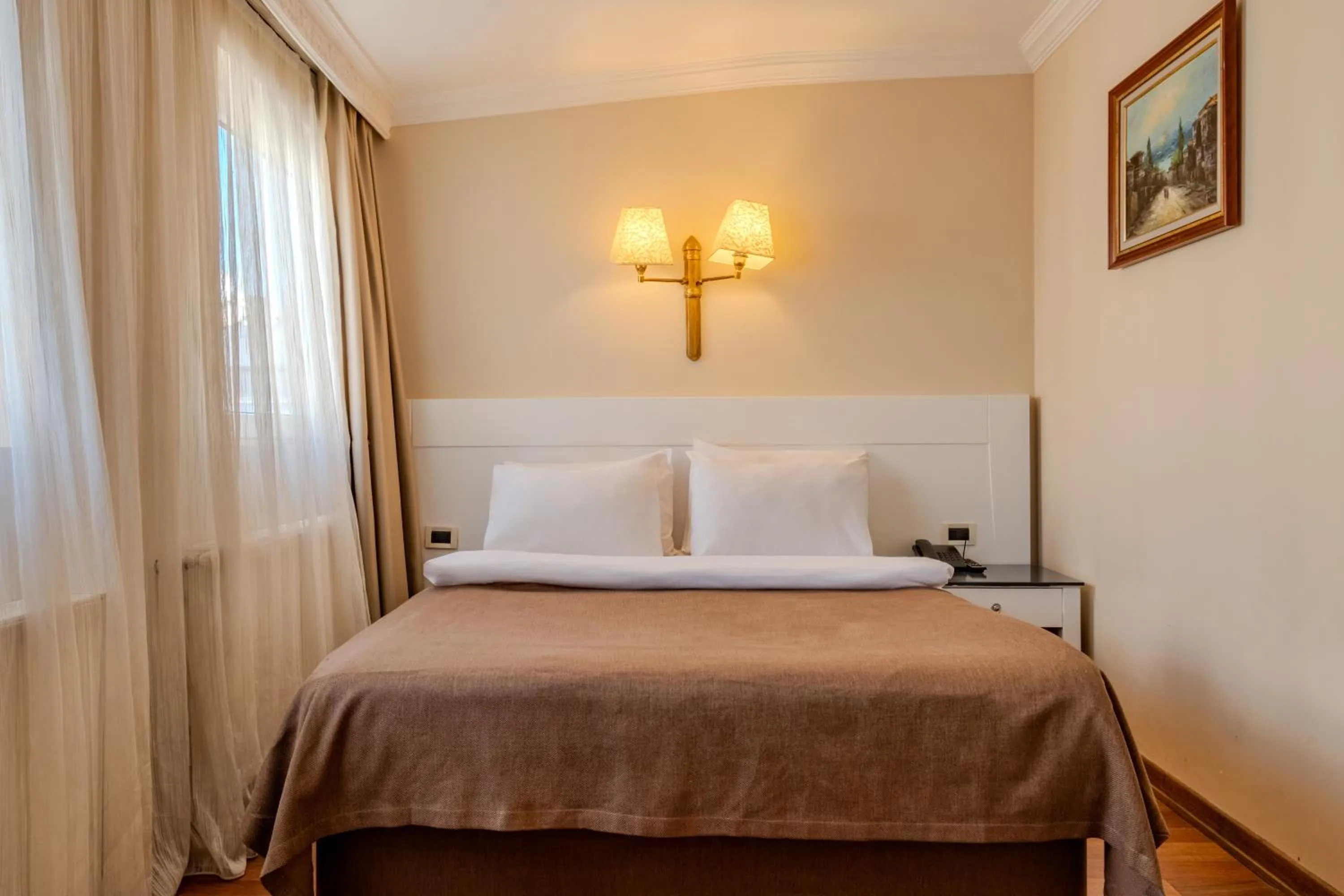 Bed in Peak Star Hotel