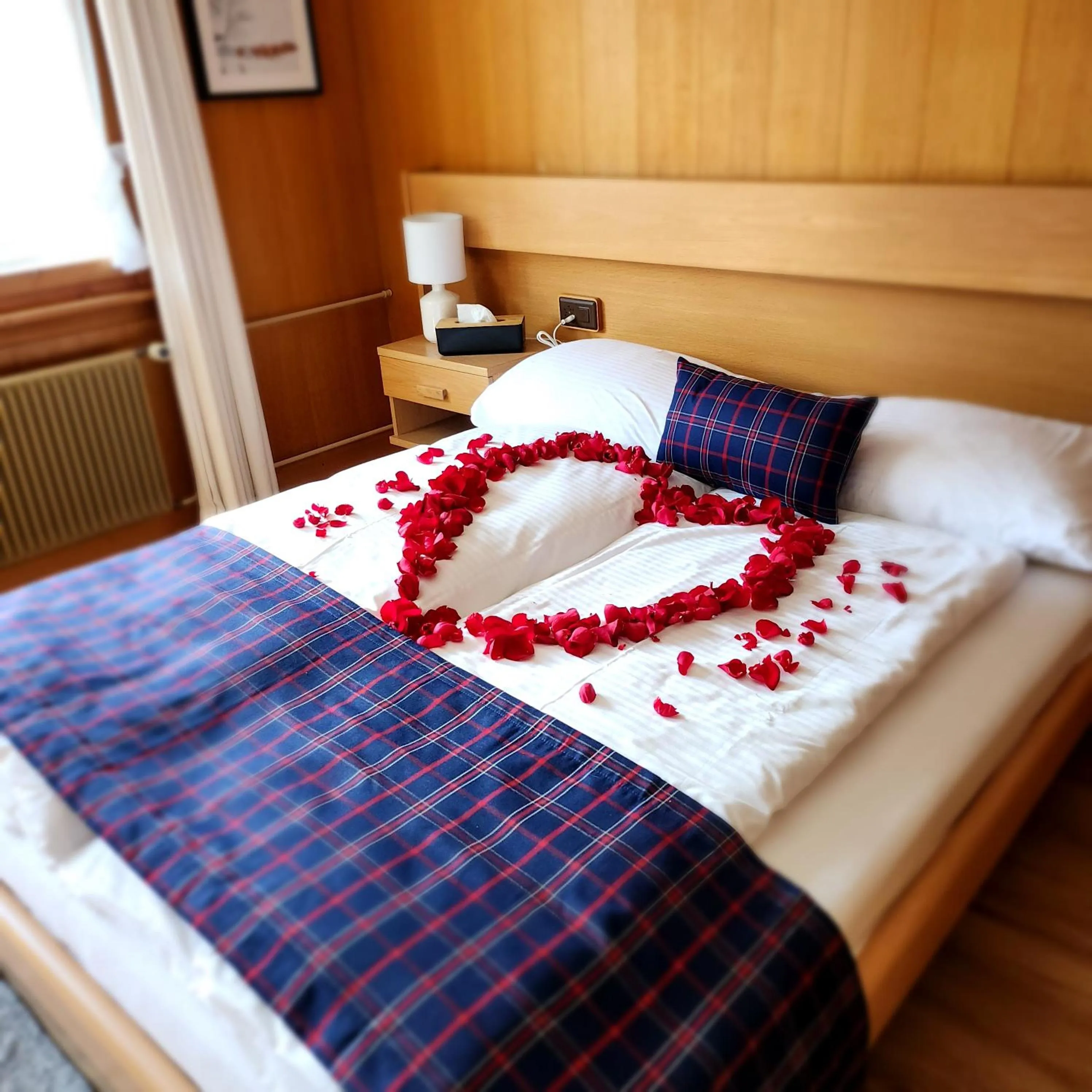 Bedroom, Bed in Alpina Boutique Hotel Interlaken - Ringgenberg - Adults only !