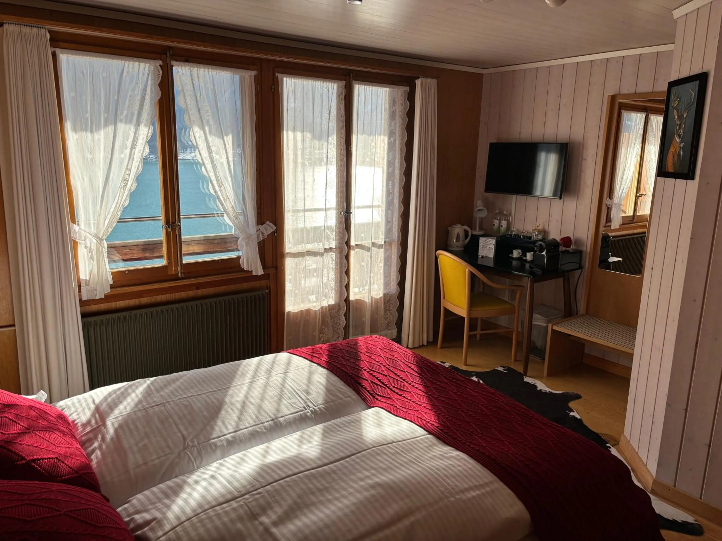 Bedroom, Bed in Alpina Boutique Hotel Interlaken - Ringgenberg - Adults only !