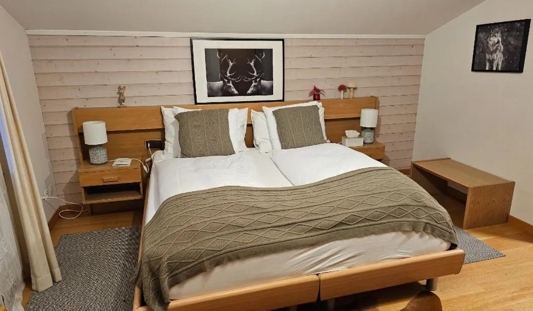 Bedroom, Bed in Alpina Boutique Hotel Interlaken - Ringgenberg - Adults only !