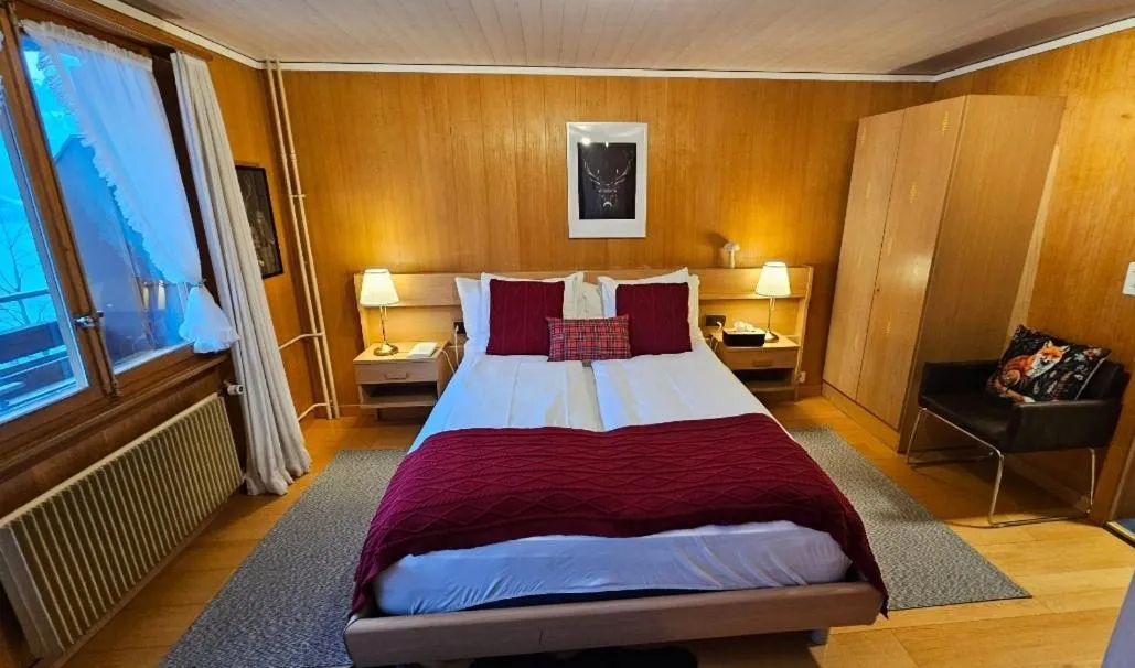 Bedroom, Bed in Alpina Boutique Hotel Interlaken - Ringgenberg - Adults only !