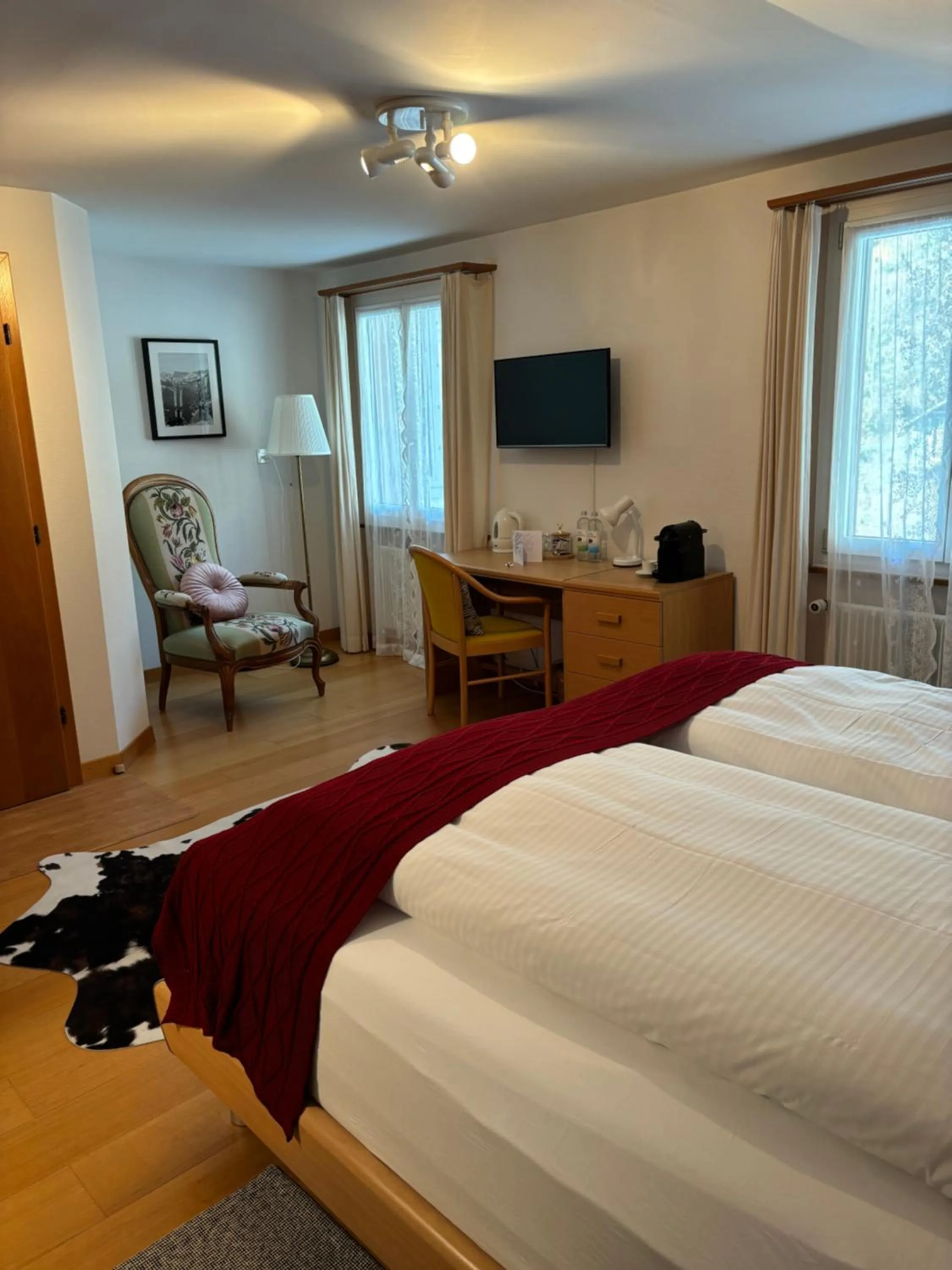 Bed in Alpina Boutique Hotel Interlaken - Ringgenberg - Adults only !