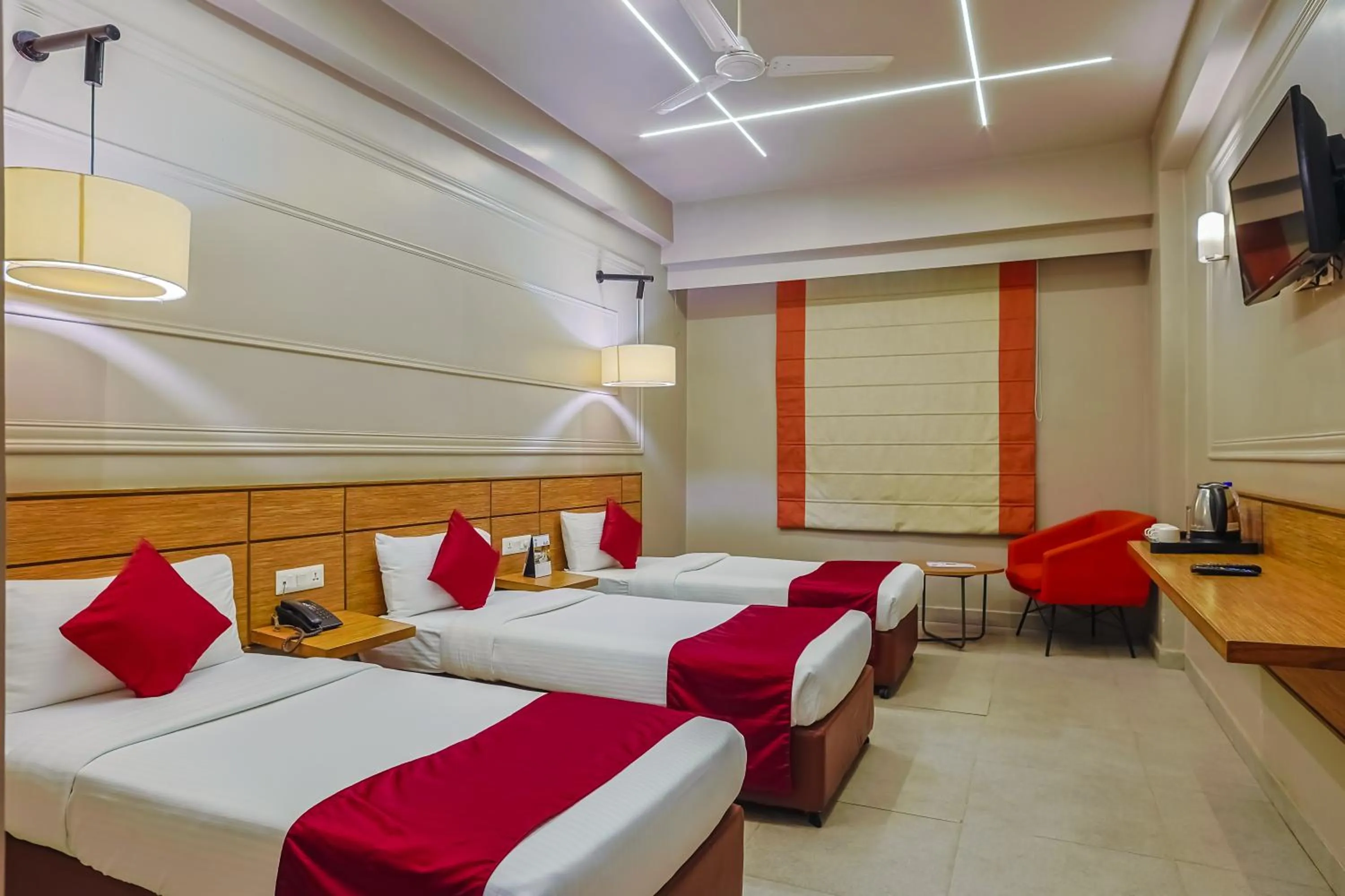Bed in Max Hotels Prayagraj