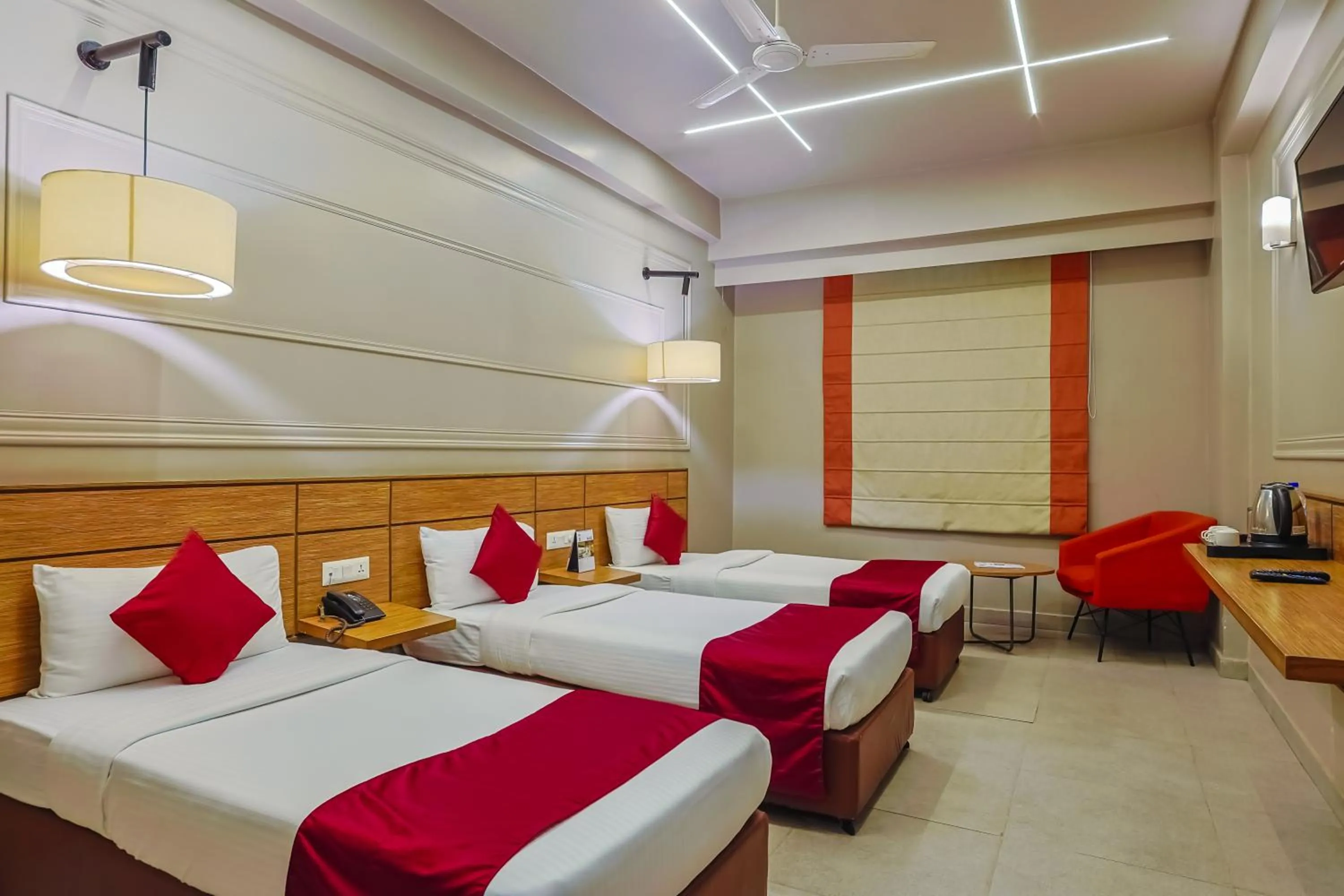 Bed in Max Hotels Prayagraj