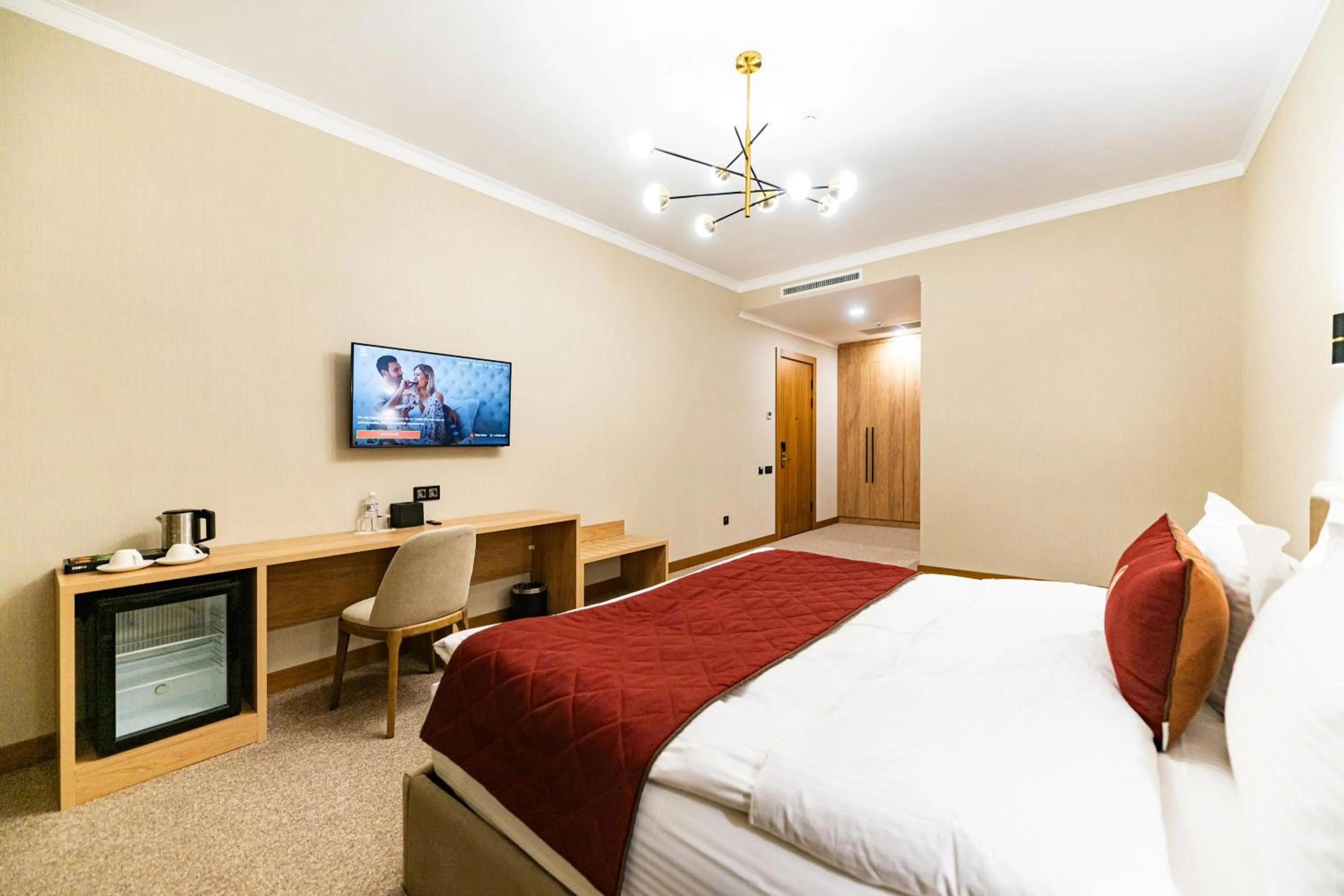 TV and multimedia, Bed in Mardan Hotel