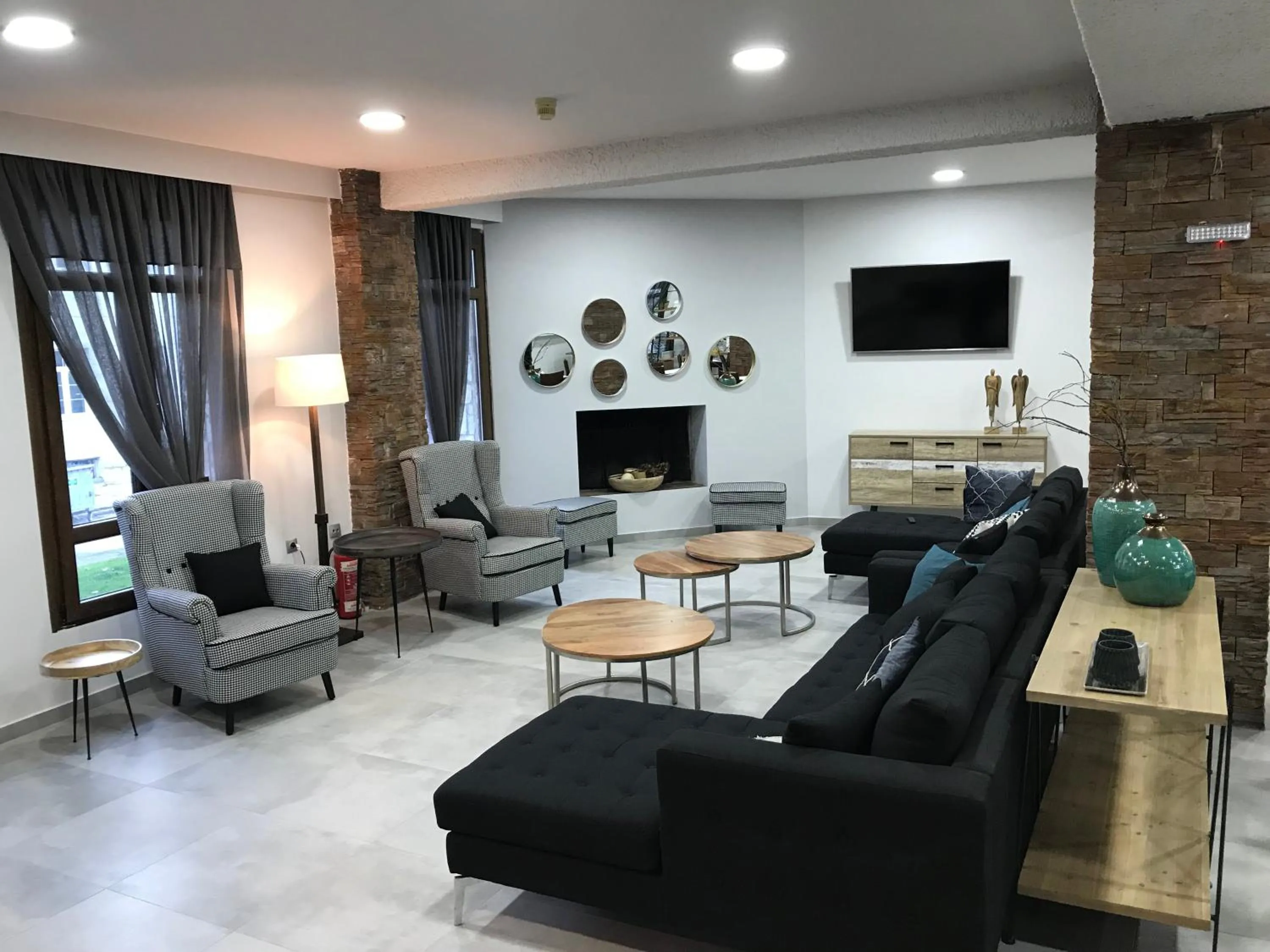 Communal lounge/ TV room in Filoxenia Hotel & Spa