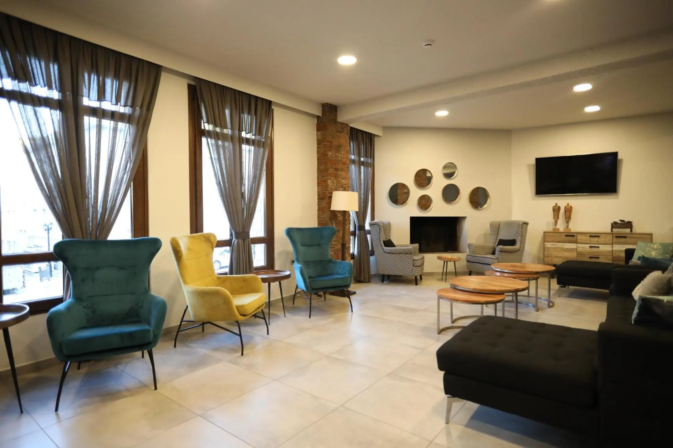 Communal lounge/ TV room in Filoxenia Hotel & Spa