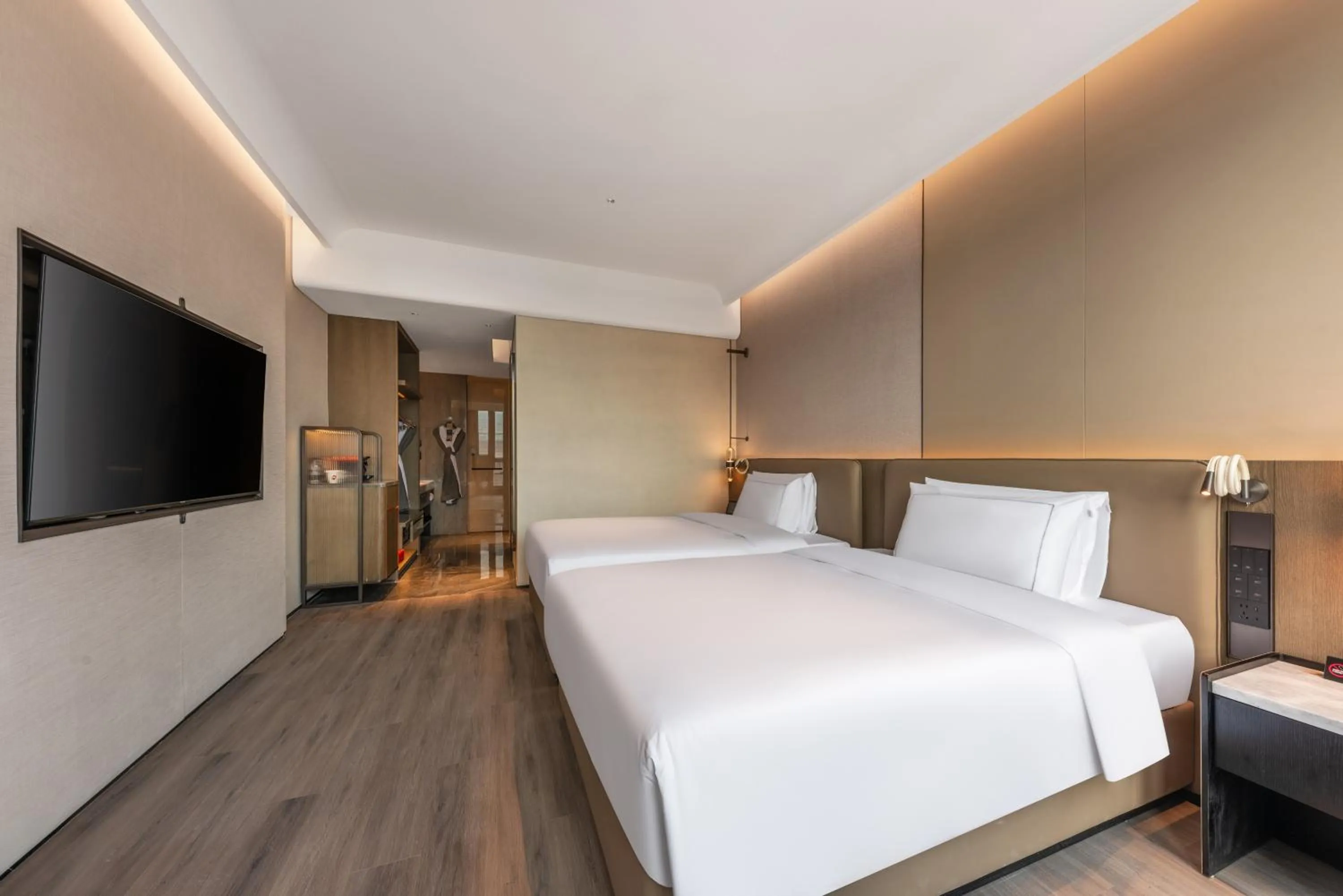 Bed in UrCove by Hyatt Shenzhen Bay Mixc