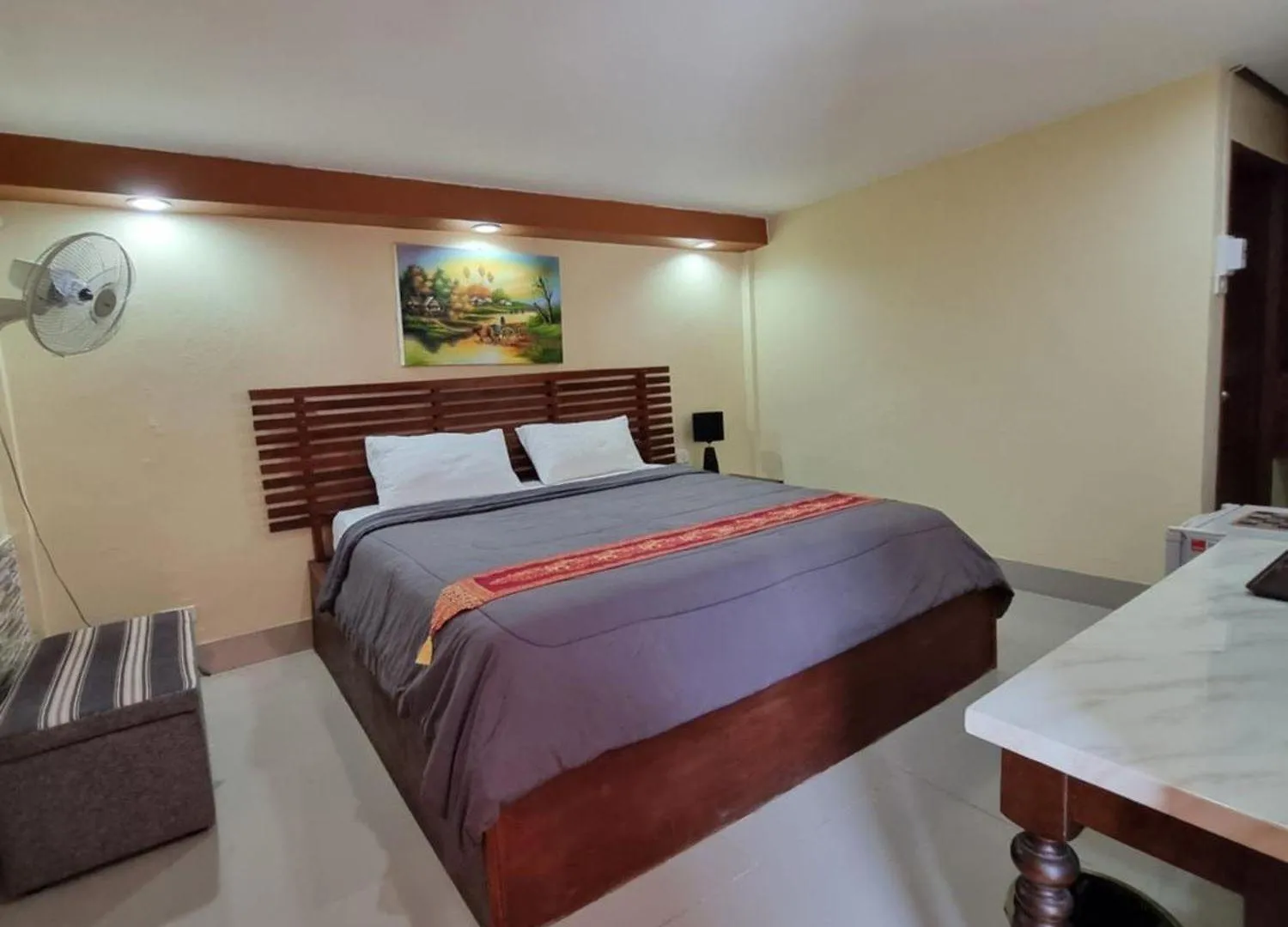 Bed in The Windsor Boutique Resort