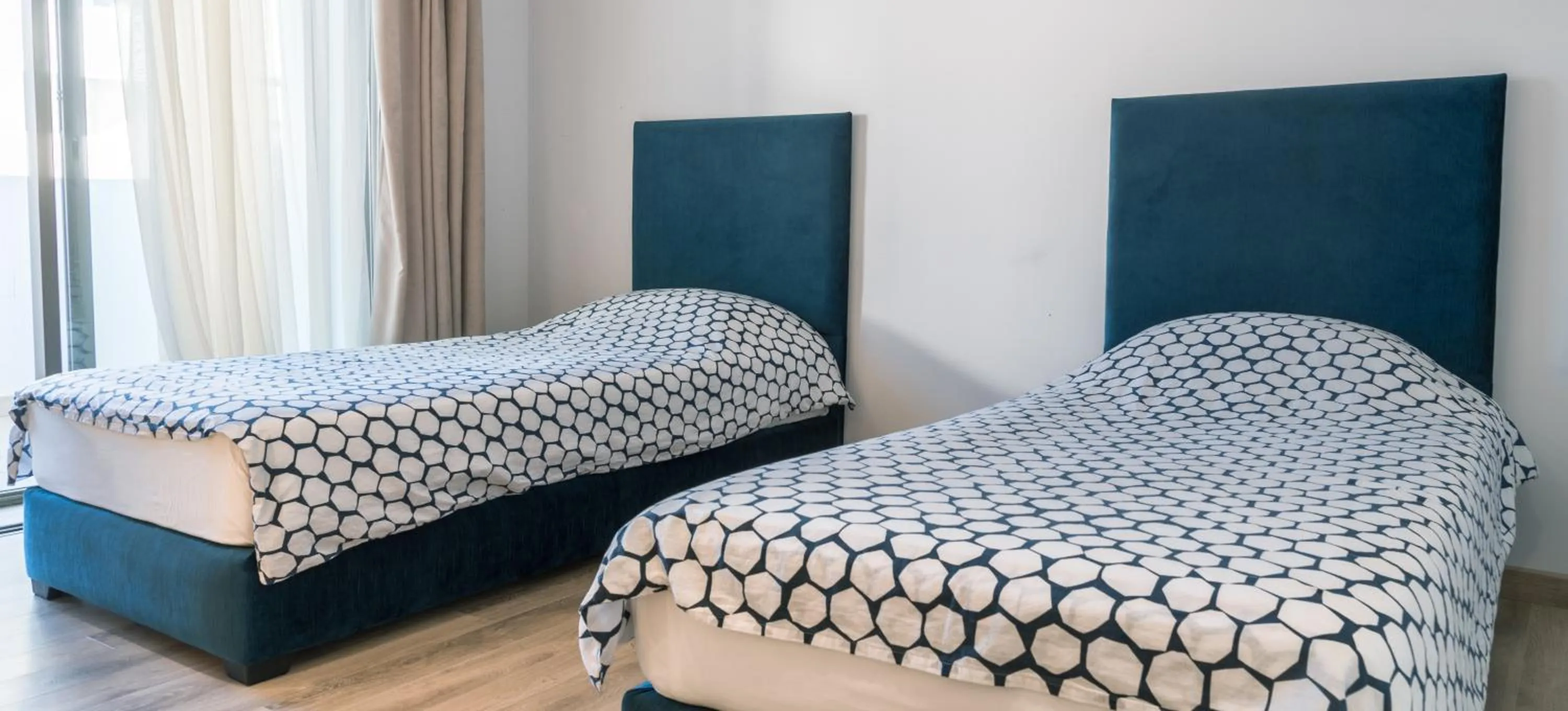 Bed in Marina Rabat Suites & Apartments