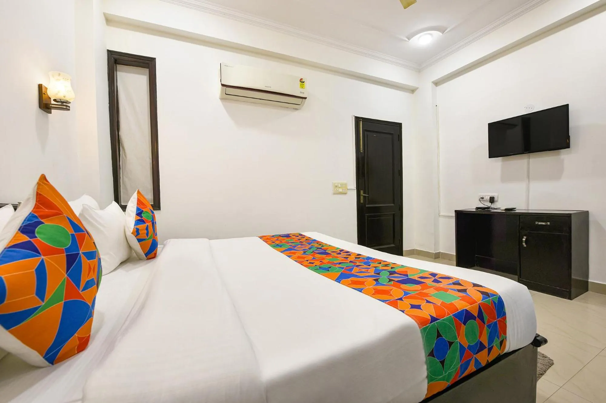 Bed in FabHotel Velvet Suites Near Millennium City Centre Gurugram