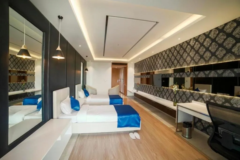 Bed in BNGV Grandeur Hotel & Banquets