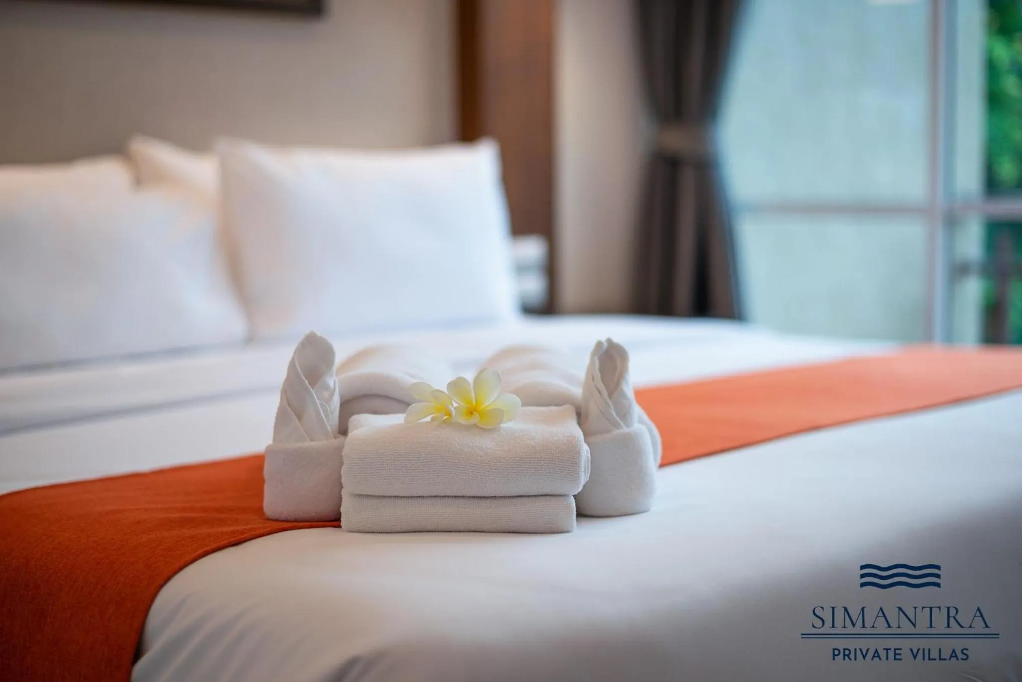 Bed in Simantra Private Villas