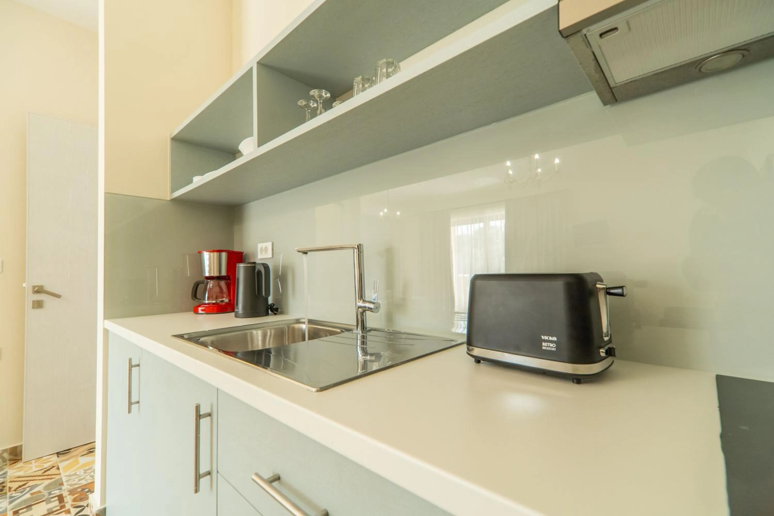 Kitchen or kitchenette in Altirina Studios