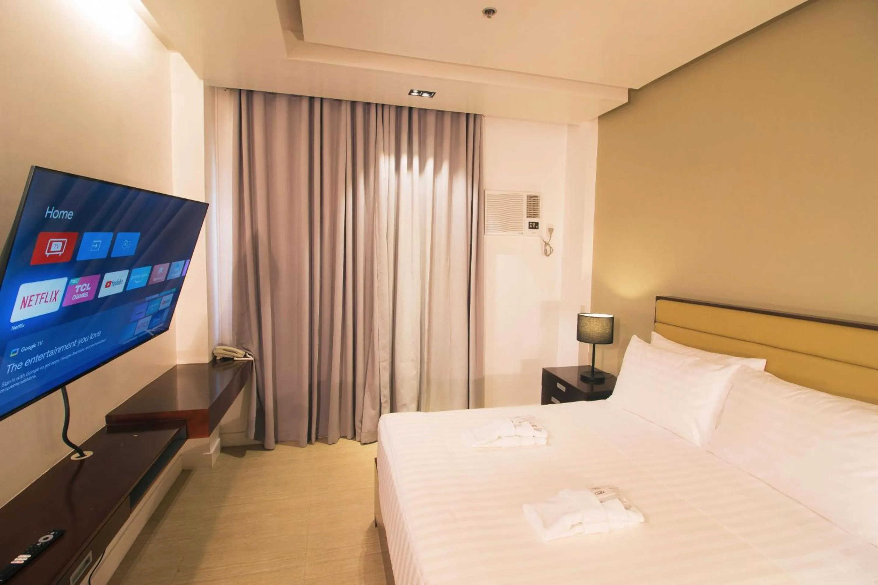 Bed in Aura Condotel