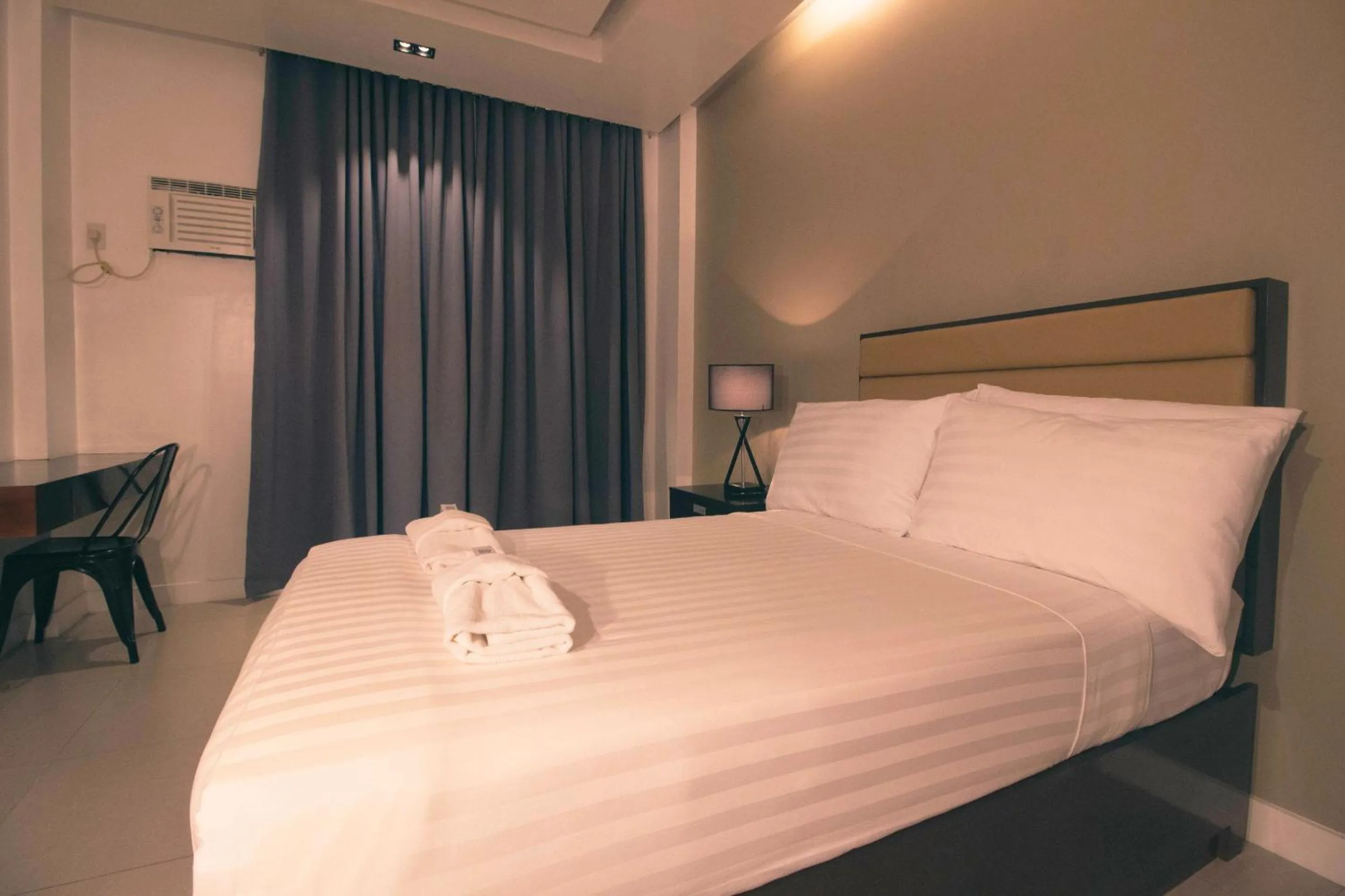 Bed in Aura Condotel