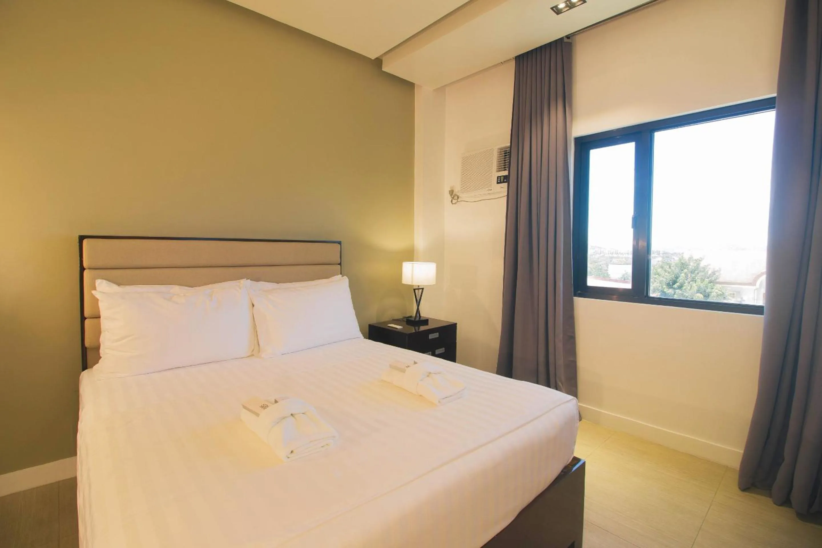 Bed in Aura Condotel