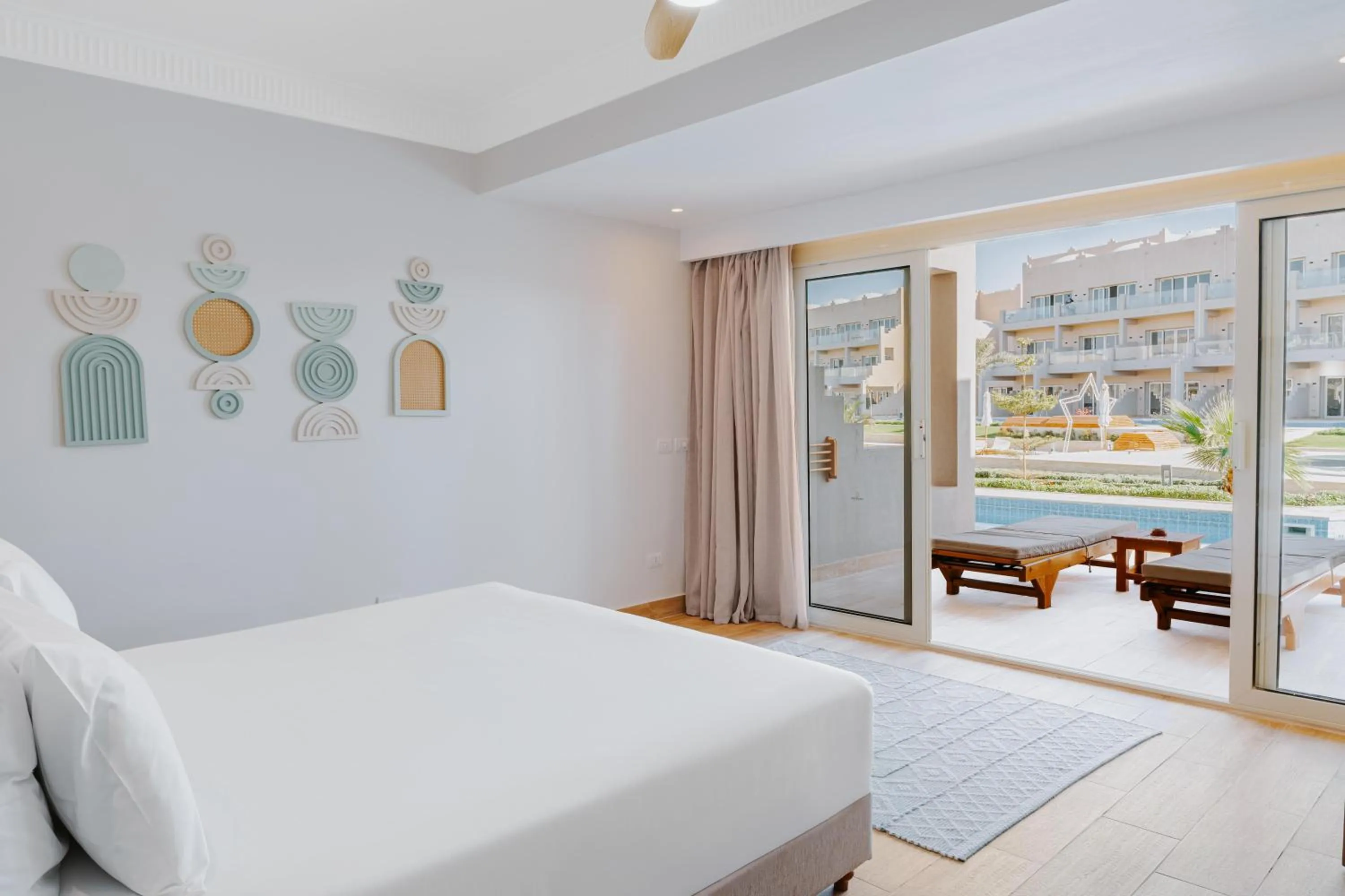 Photo of the whole room, Bed in Diamond Beach by Pearl Resorts