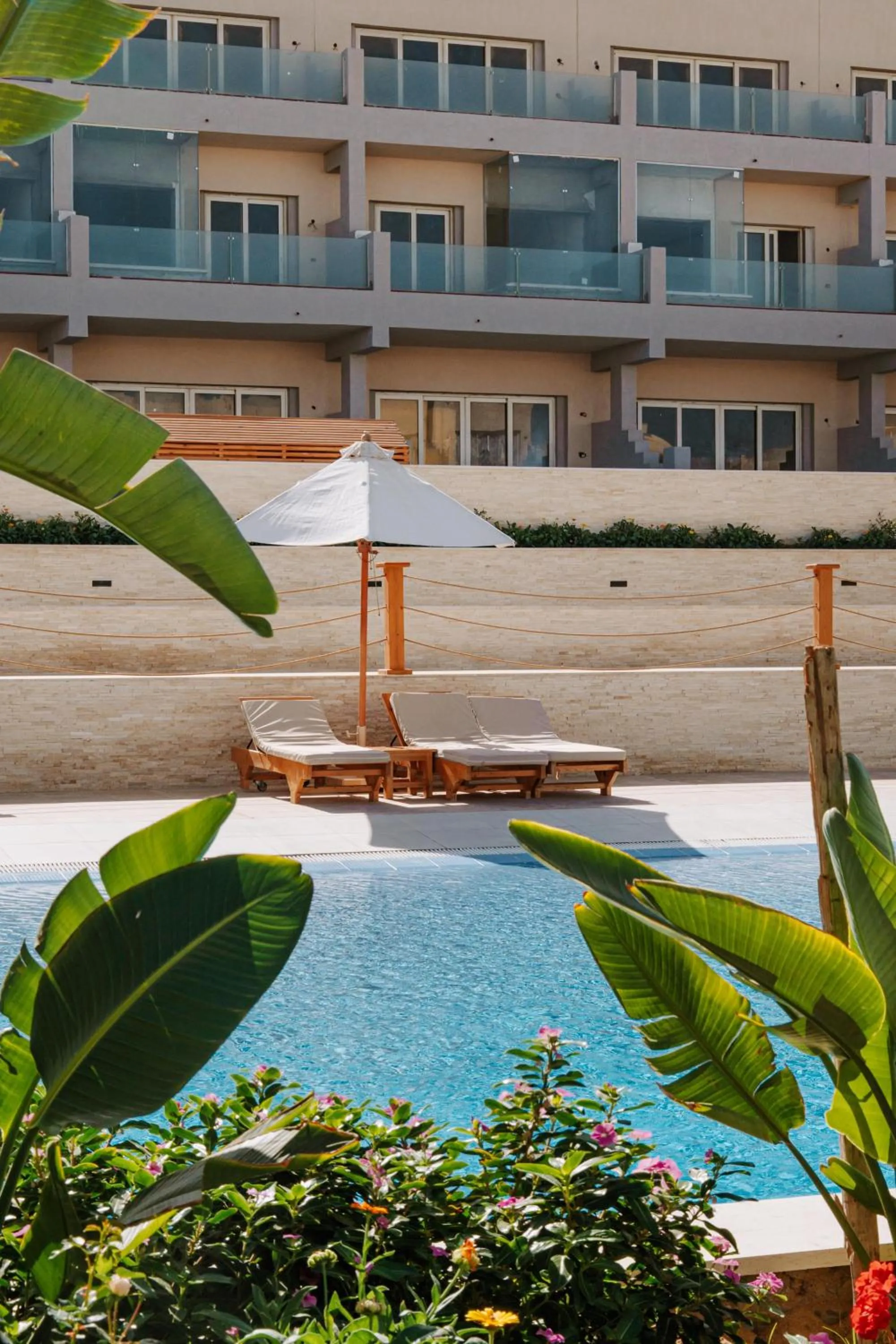 Swimming pool in Diamond Beach by Pearl Resorts