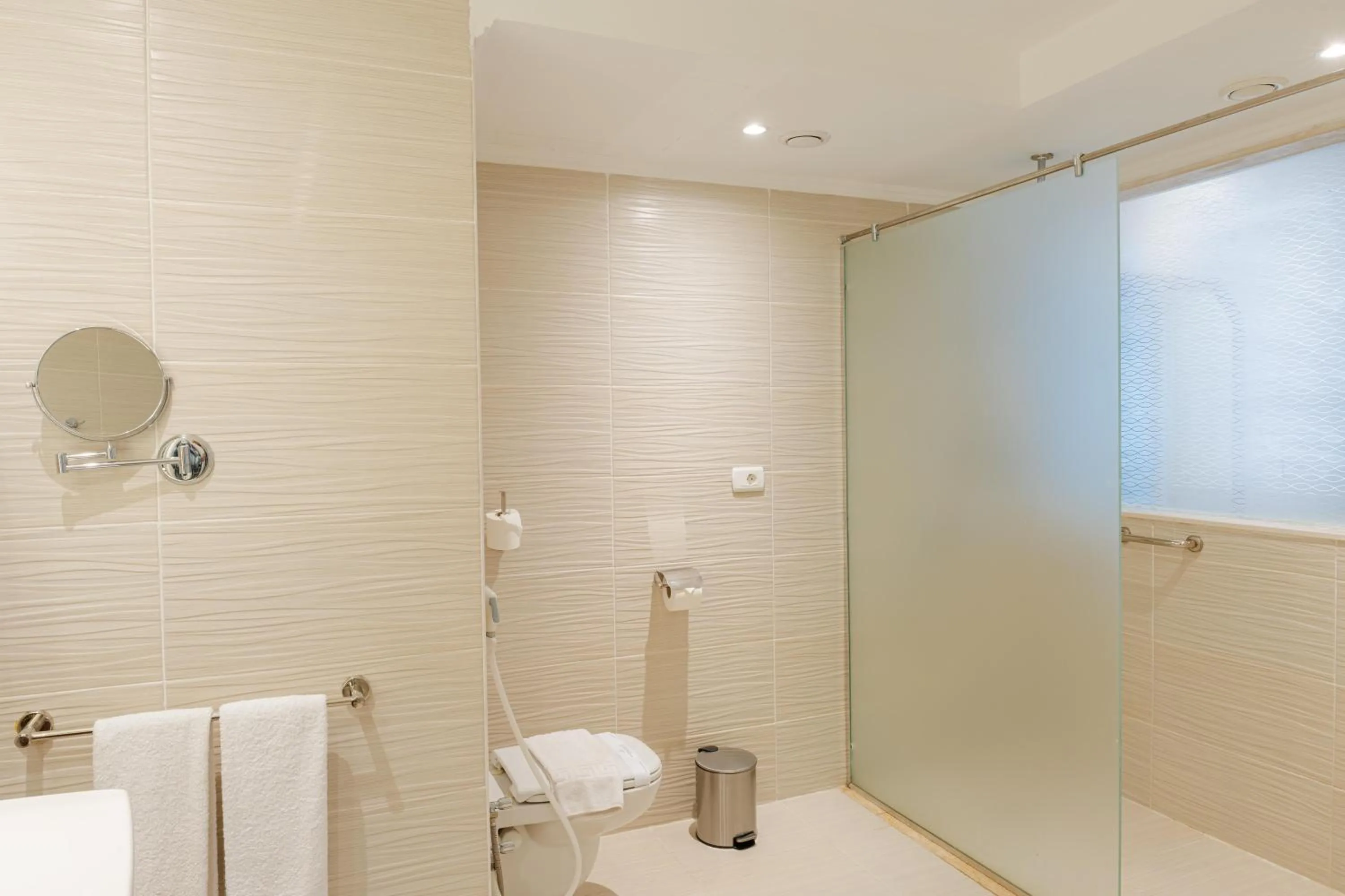 Bathroom in Diamond Beach by Pearl Resorts