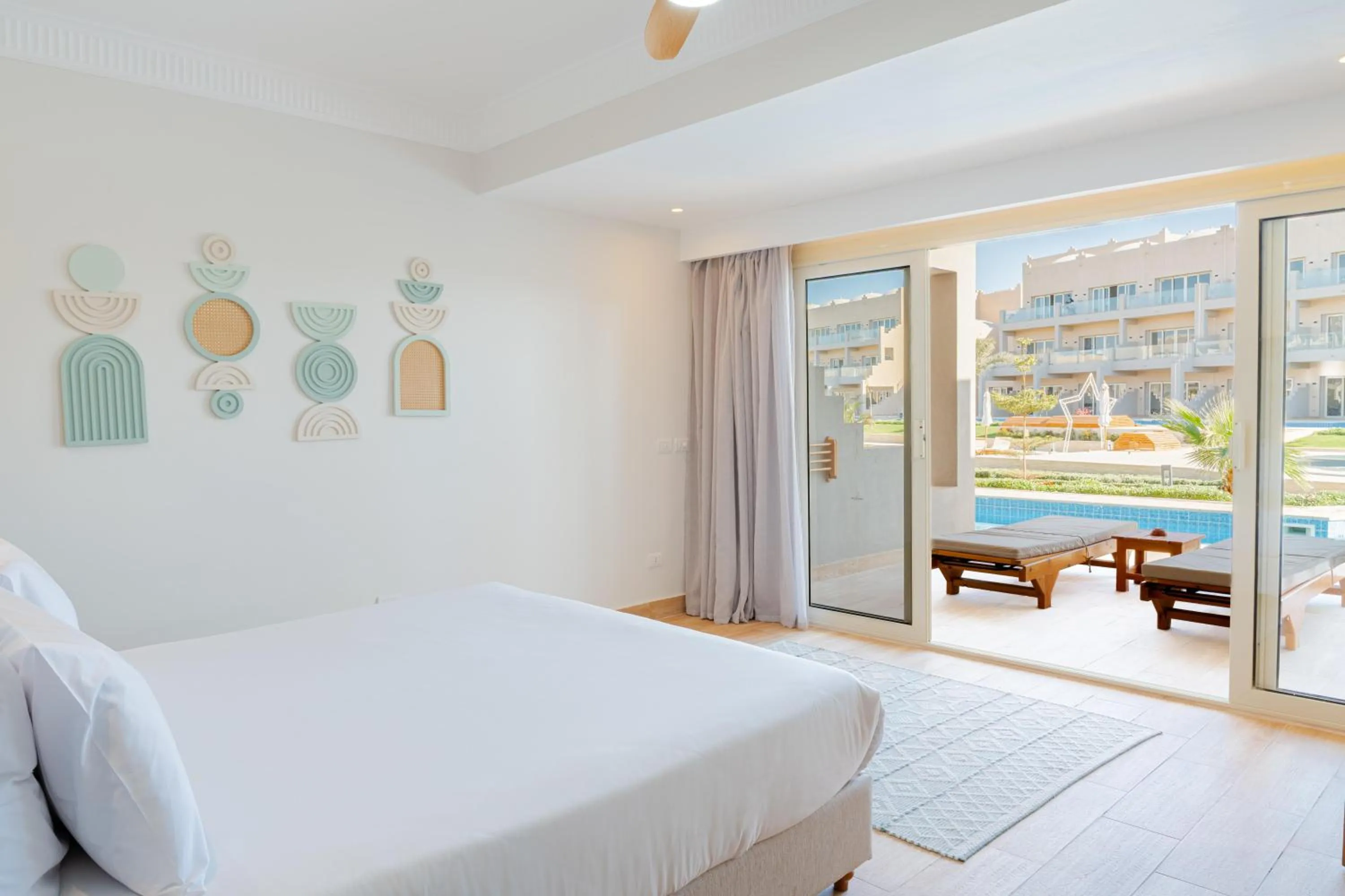 Photo of the whole room, Bed in Diamond Beach by Pearl Resorts
