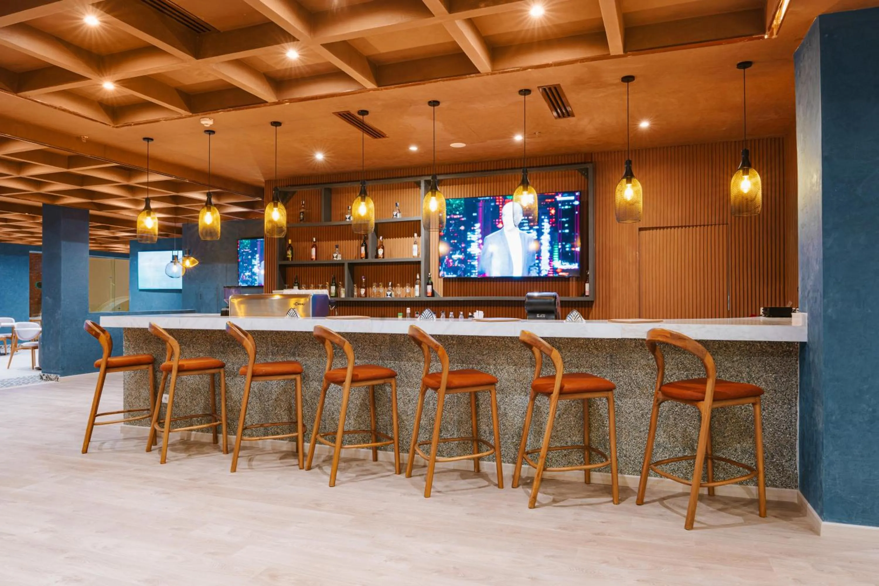 Lounge or bar in Diamond Beach by Pearl Resorts