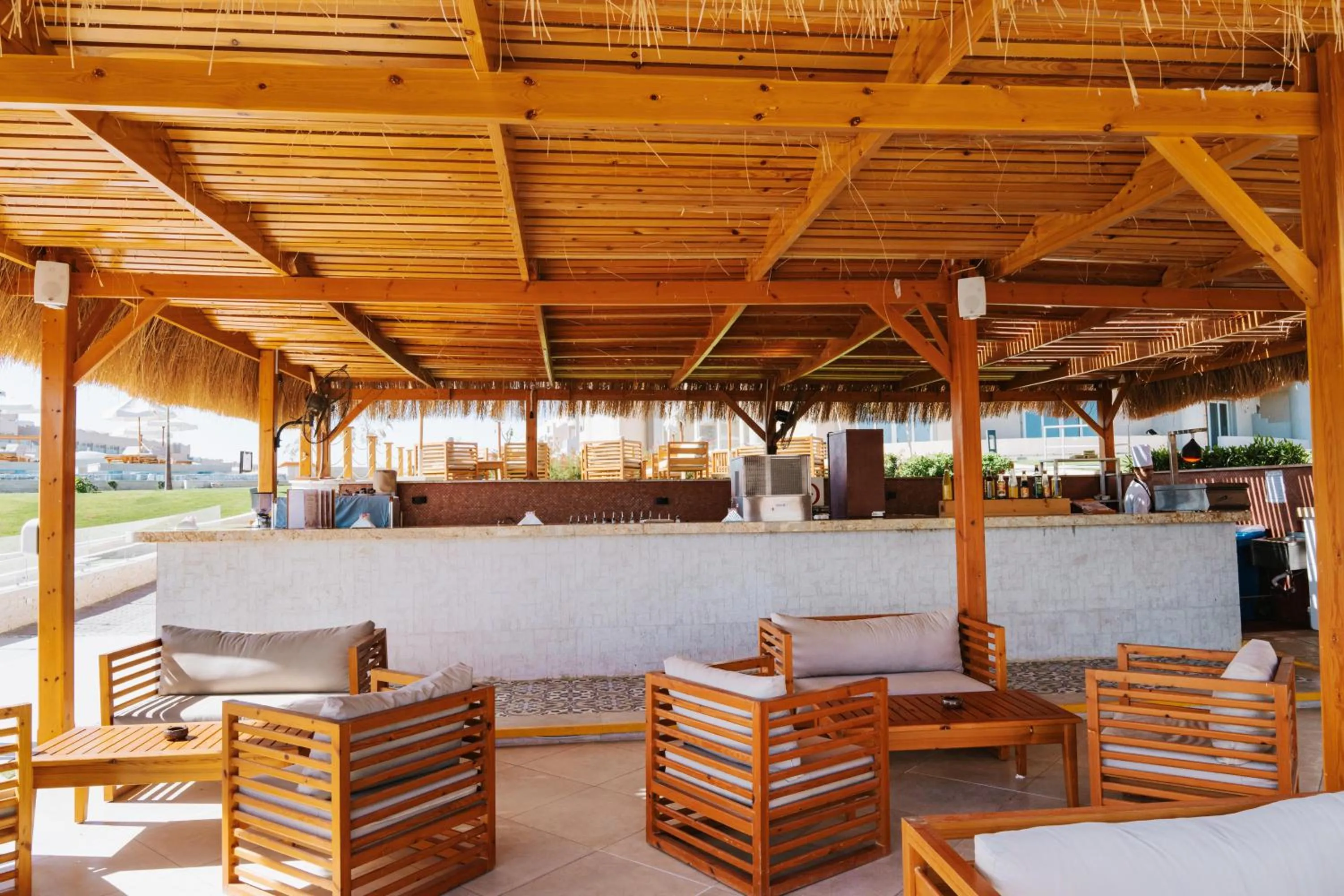 Lounge or bar in Diamond Beach by Pearl Resorts