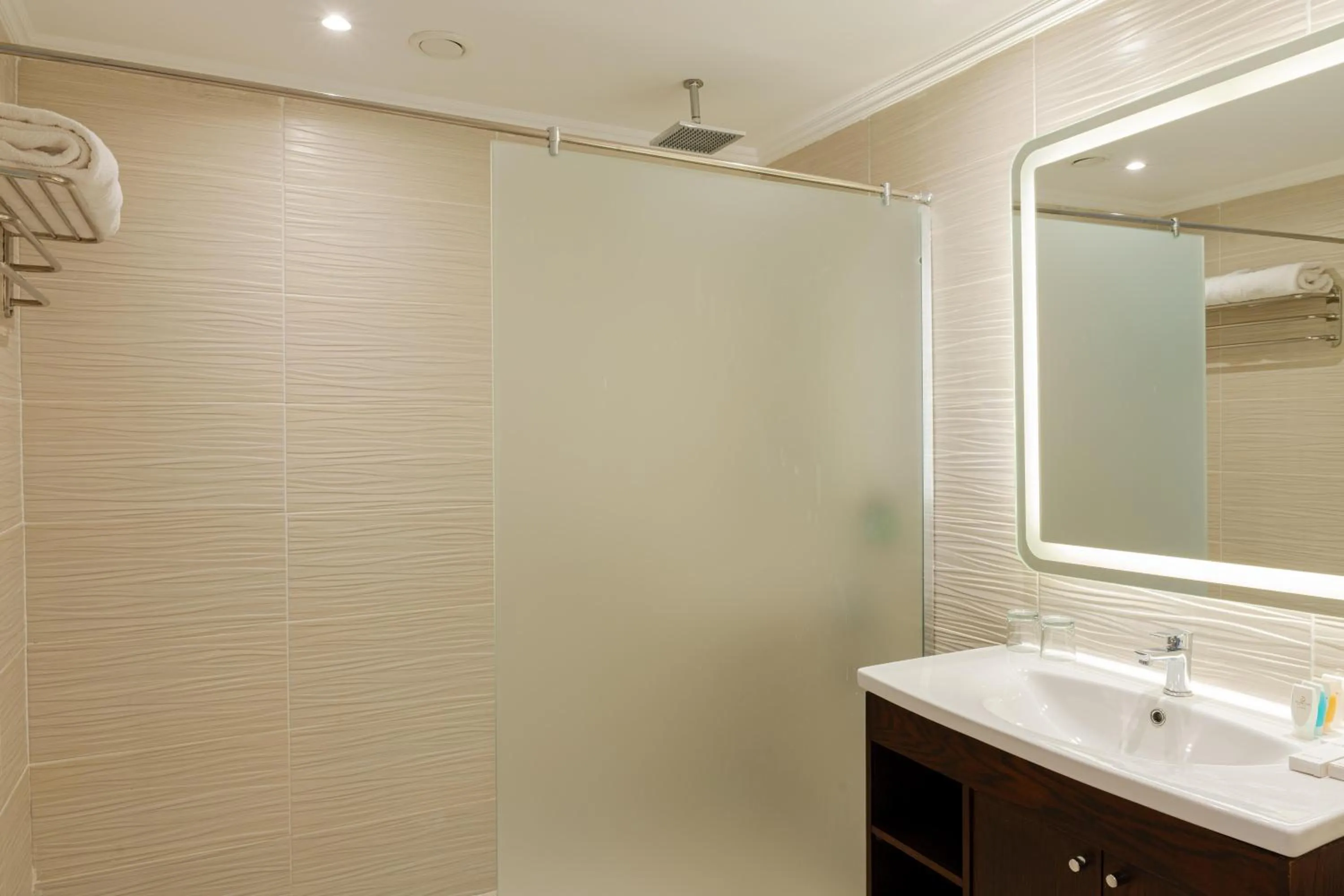 Bathroom in Diamond Beach by Pearl Resorts