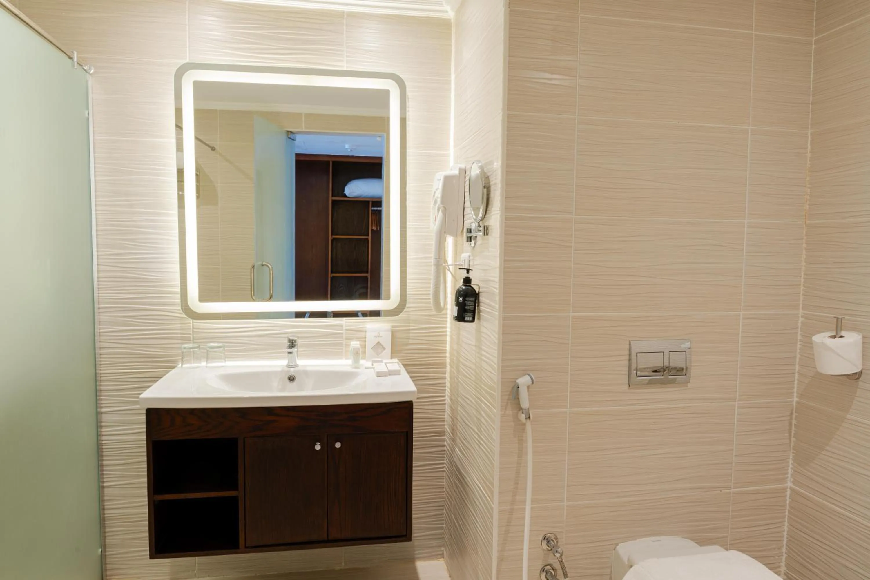 Bathroom in Diamond Beach by Pearl Resorts