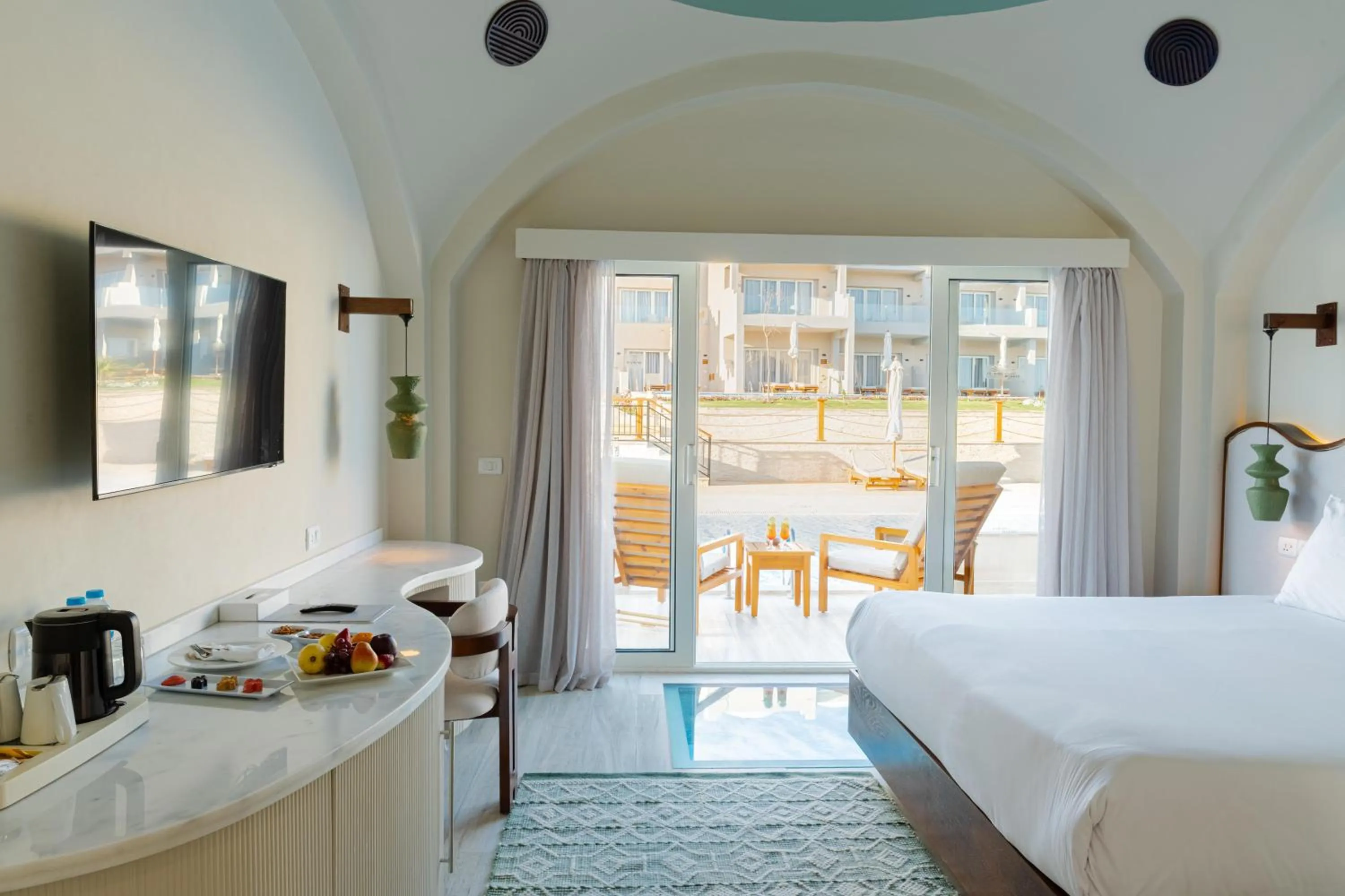 Photo of the whole room, Bed in Diamond Beach by Pearl Resorts