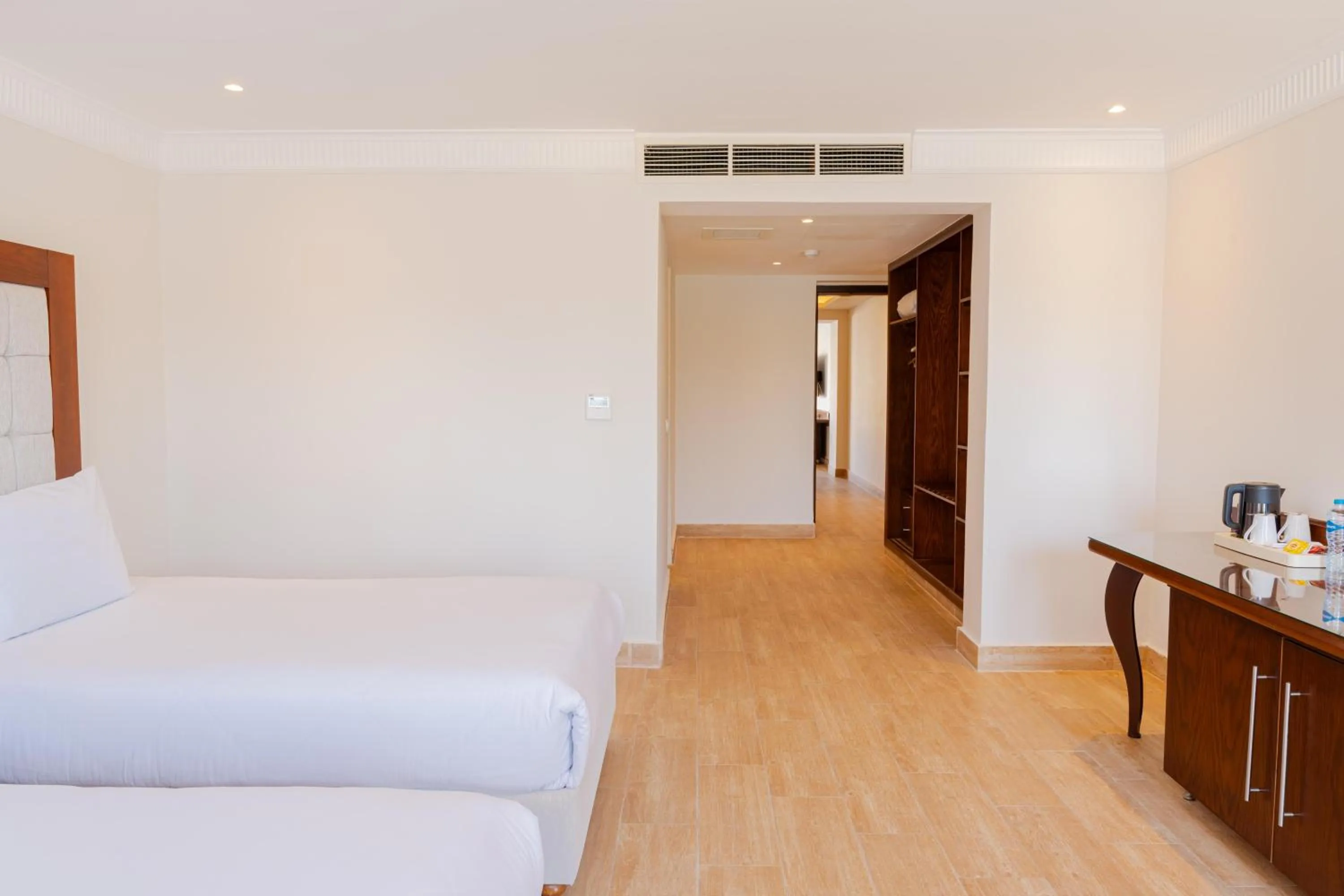 Photo of the whole room, Bed in Diamond Beach by Pearl Resorts