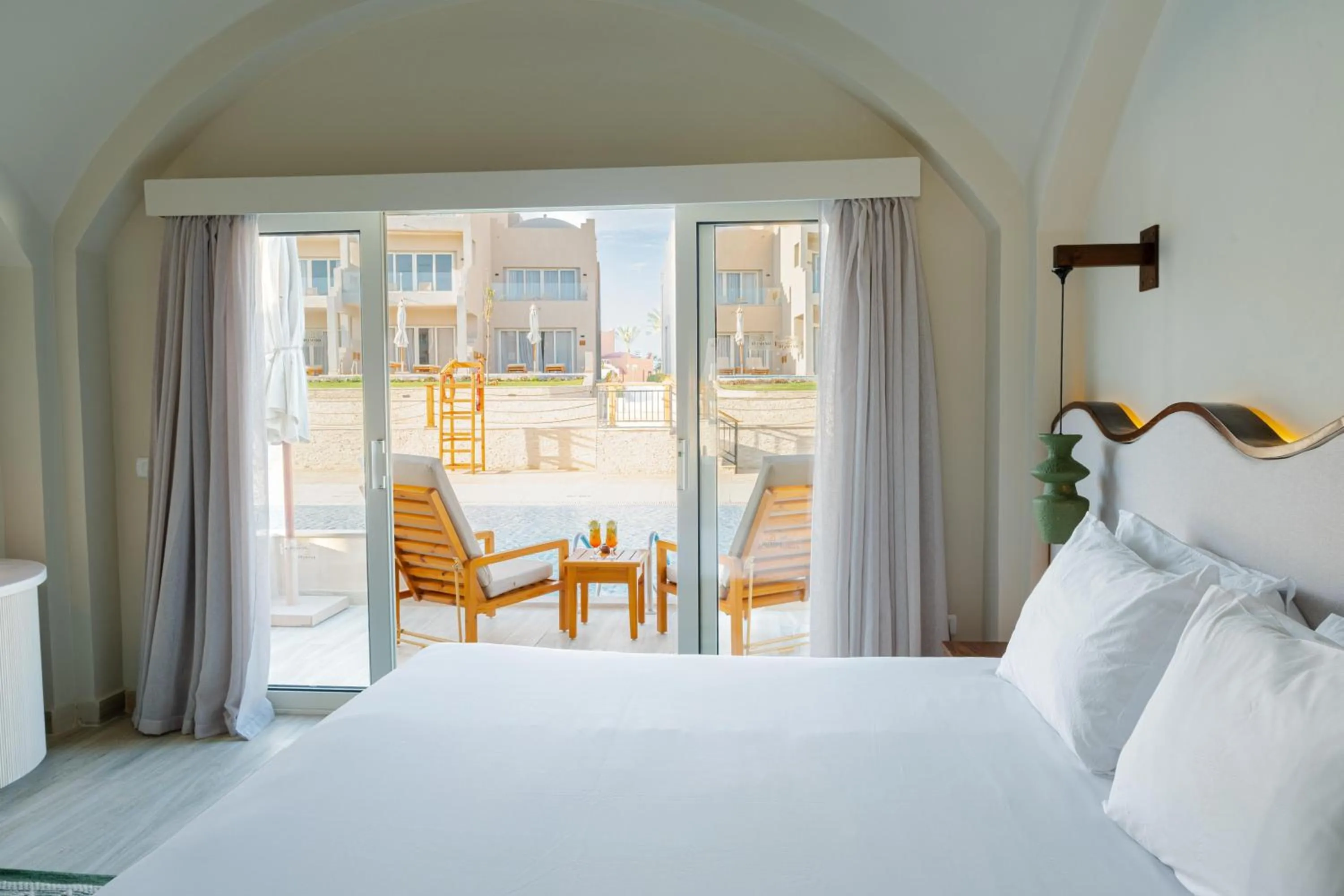 Photo of the whole room, Bed in Diamond Beach by Pearl Resorts