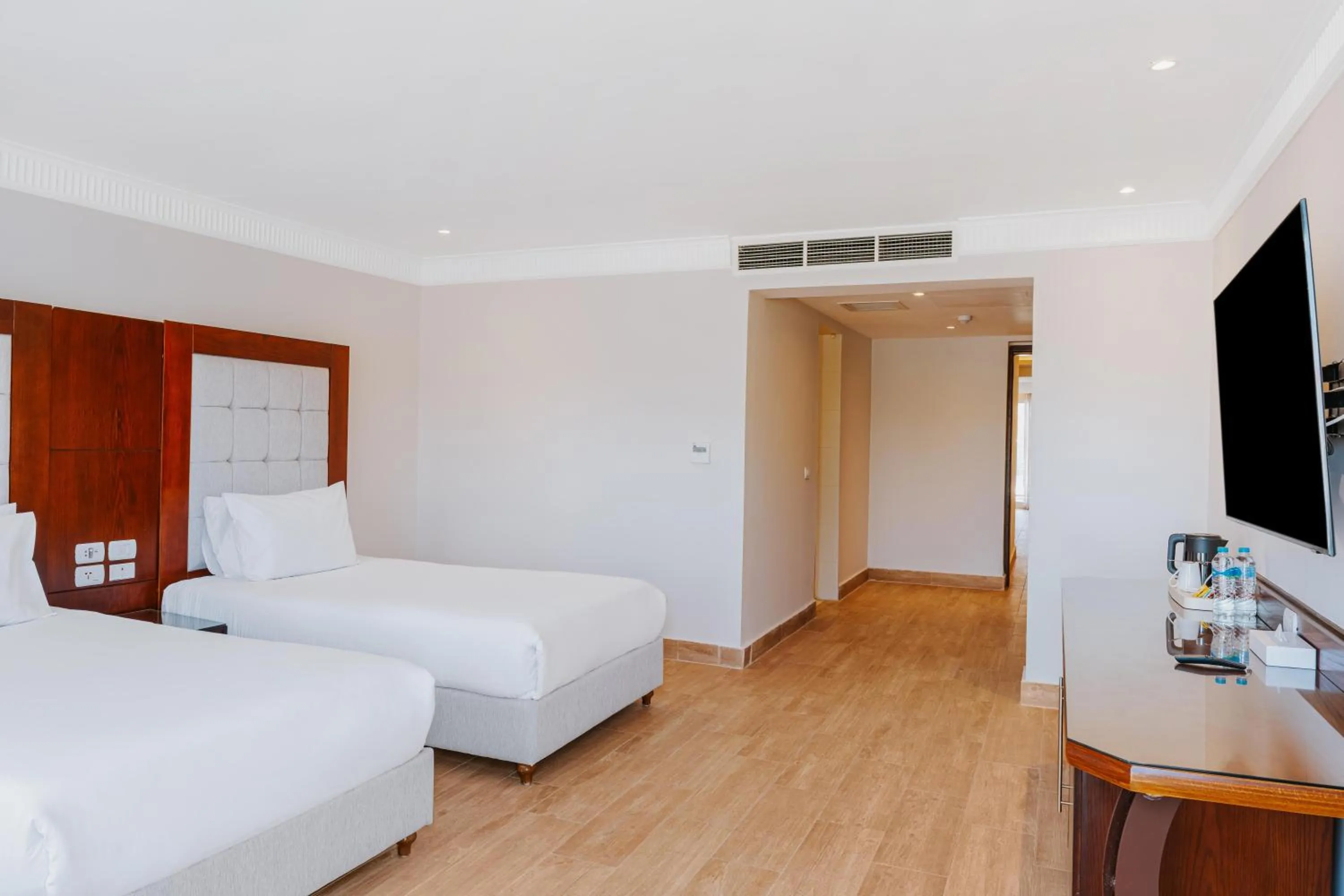 Photo of the whole room, Bed in Diamond Beach by Pearl Resorts