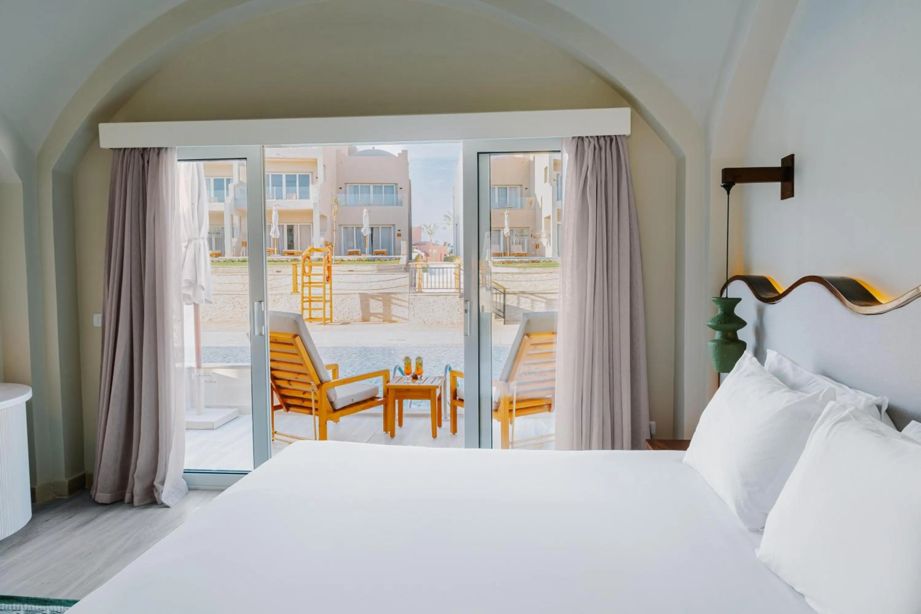 Photo of the whole room, Bed in Diamond Beach by Pearl Resorts