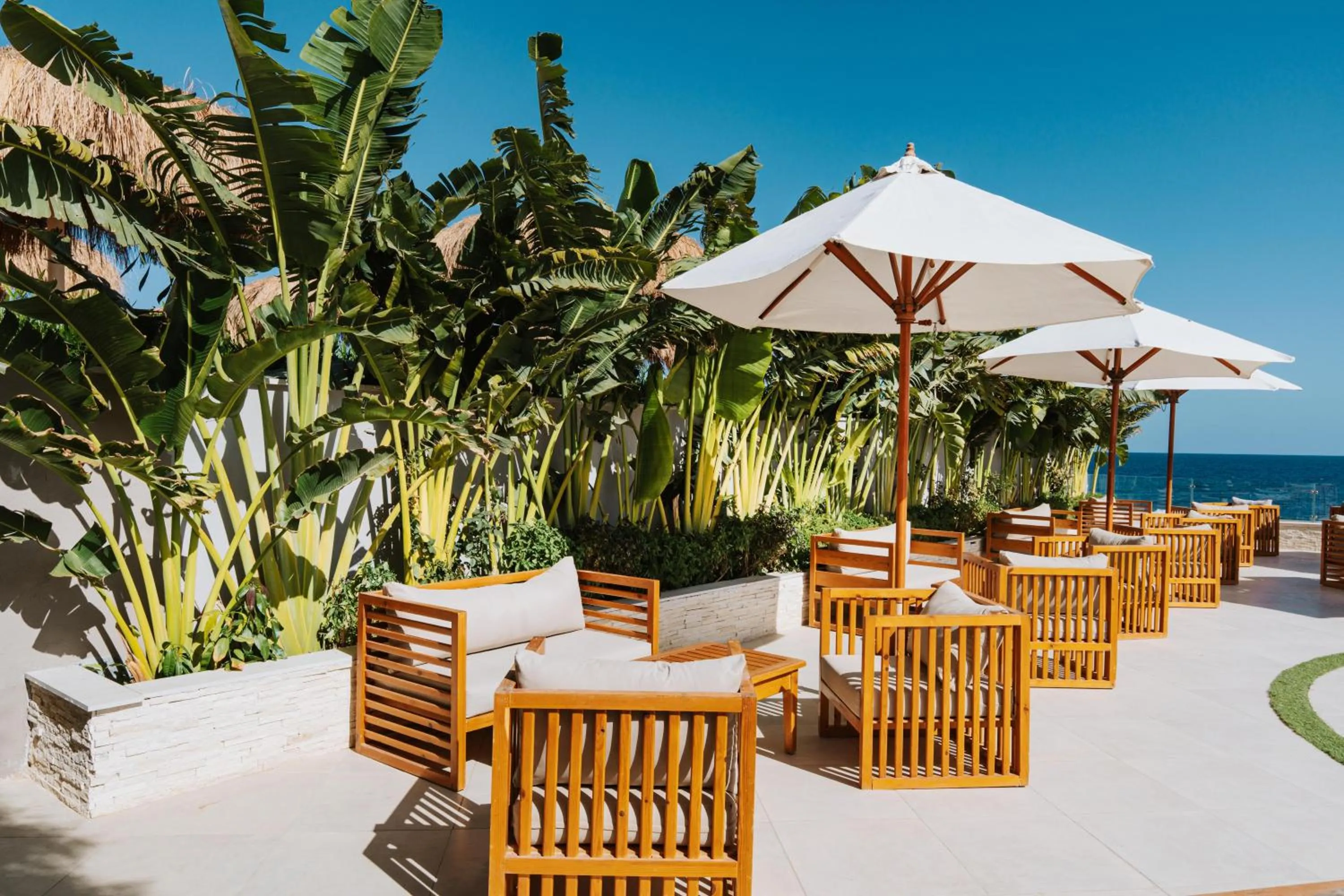 Lounge or bar in Diamond Beach by Pearl Resorts