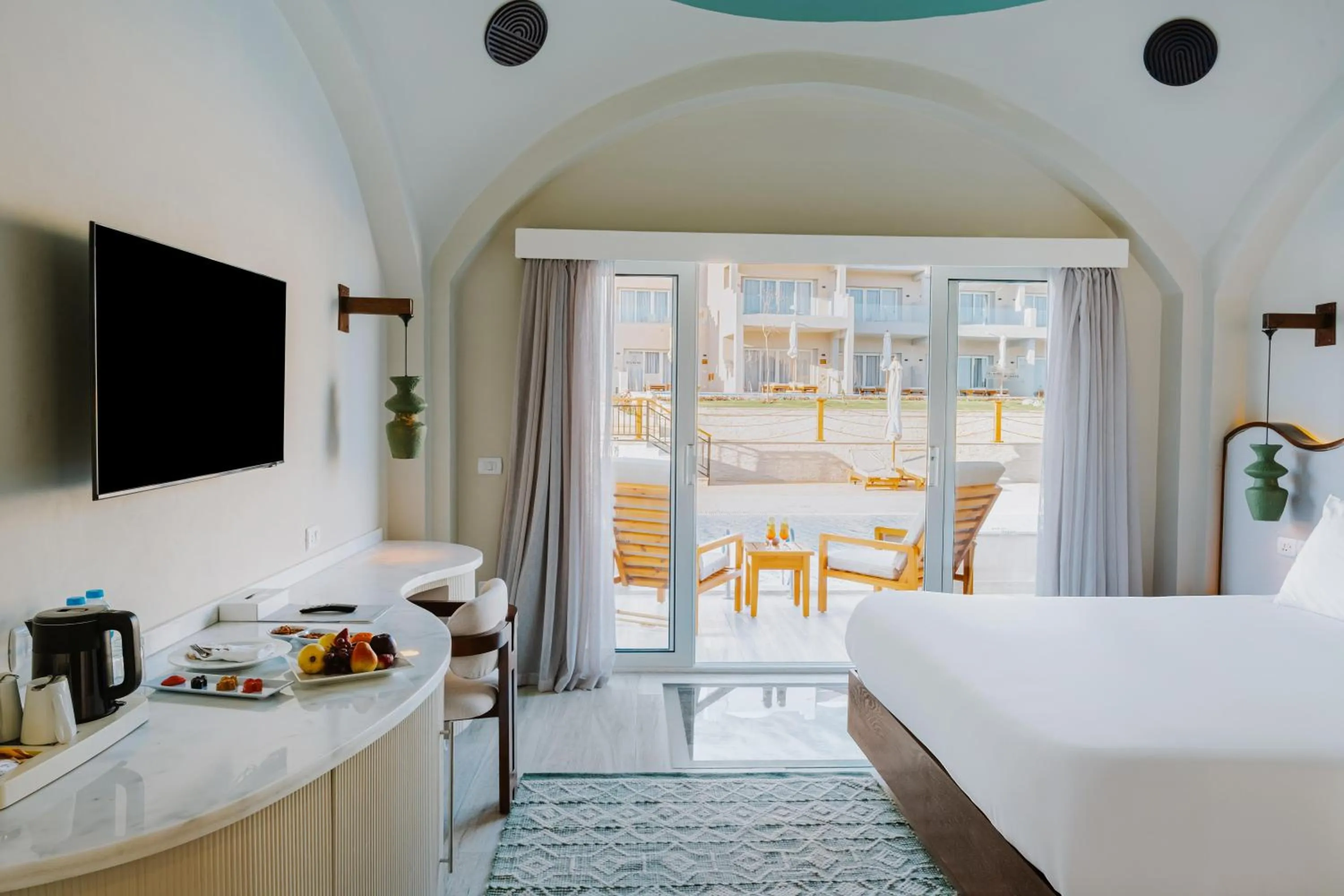 Photo of the whole room, Bed in Diamond Beach by Pearl Resorts