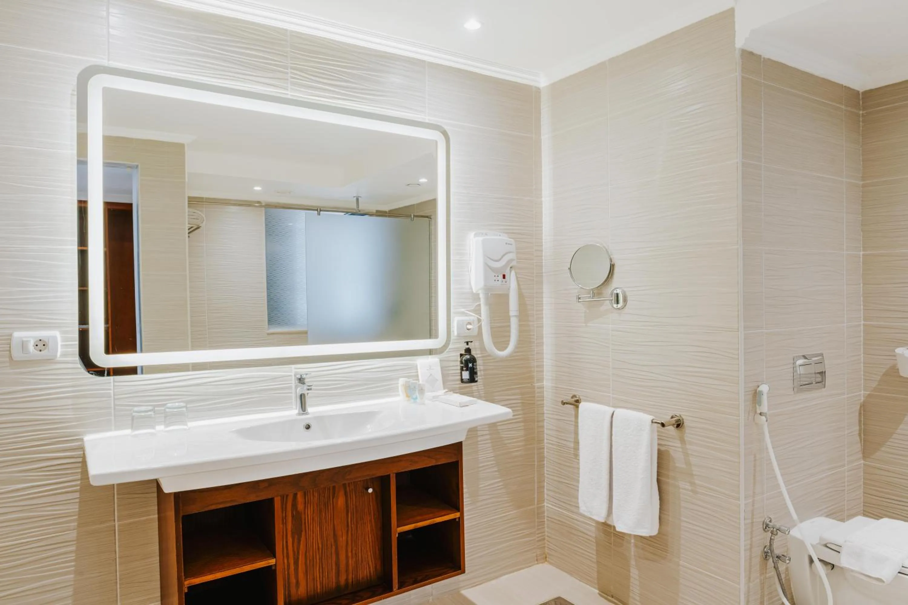 Bathroom in Diamond Beach by Pearl Resorts