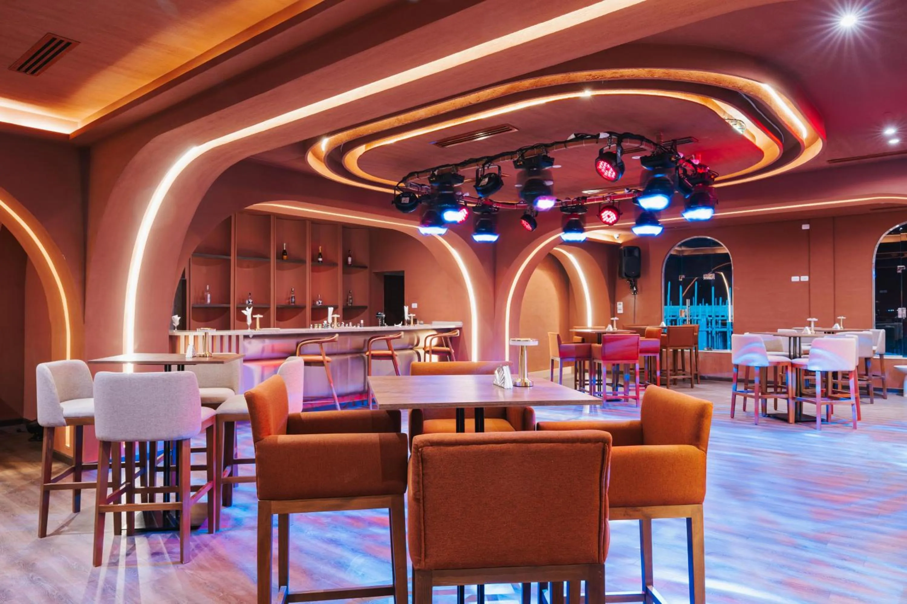 Lounge or bar in Diamond Beach by Pearl Resorts