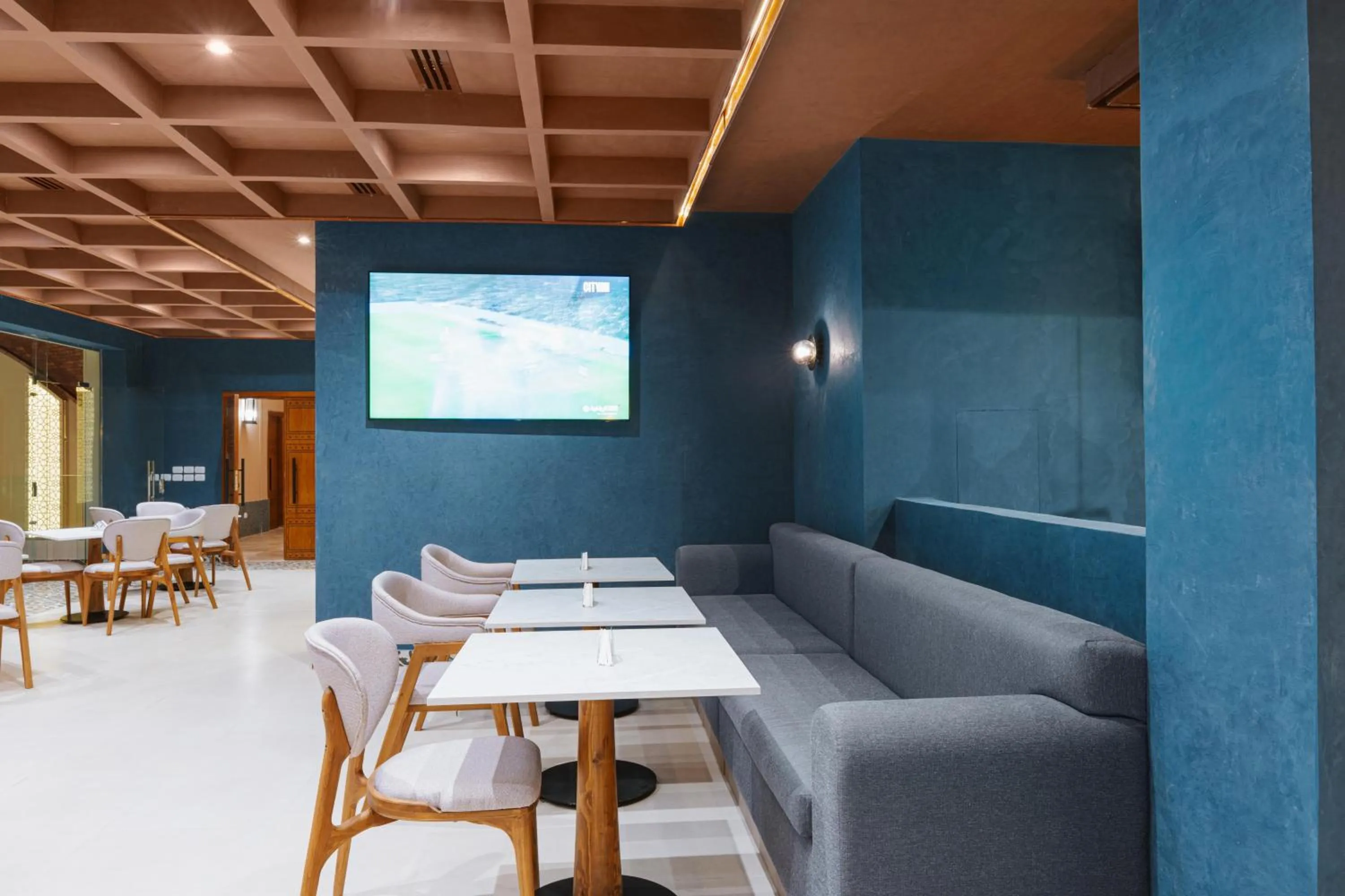 Lounge or bar in Diamond Beach by Pearl Resorts