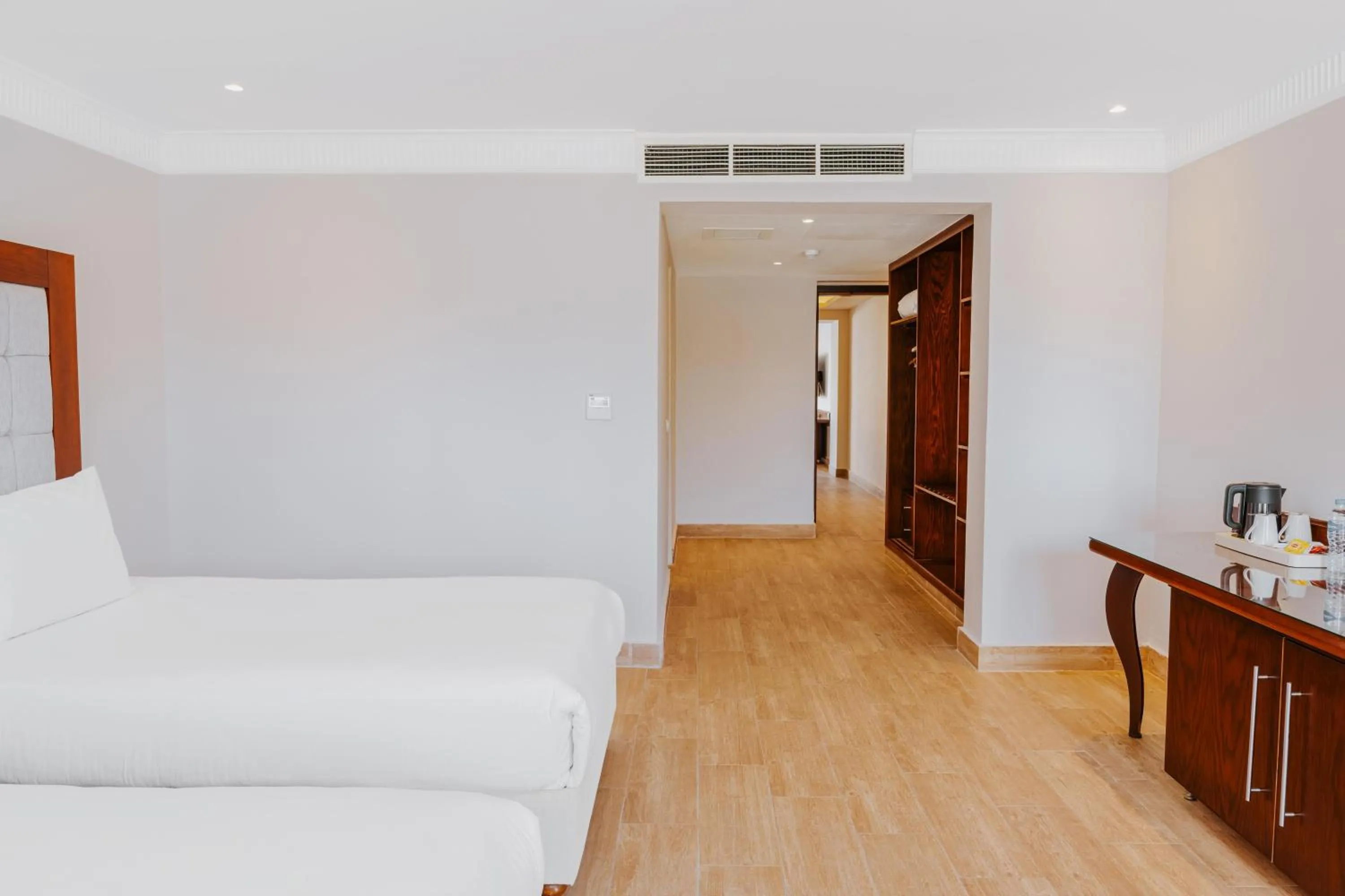 Photo of the whole room, Bed in Diamond Beach by Pearl Resorts