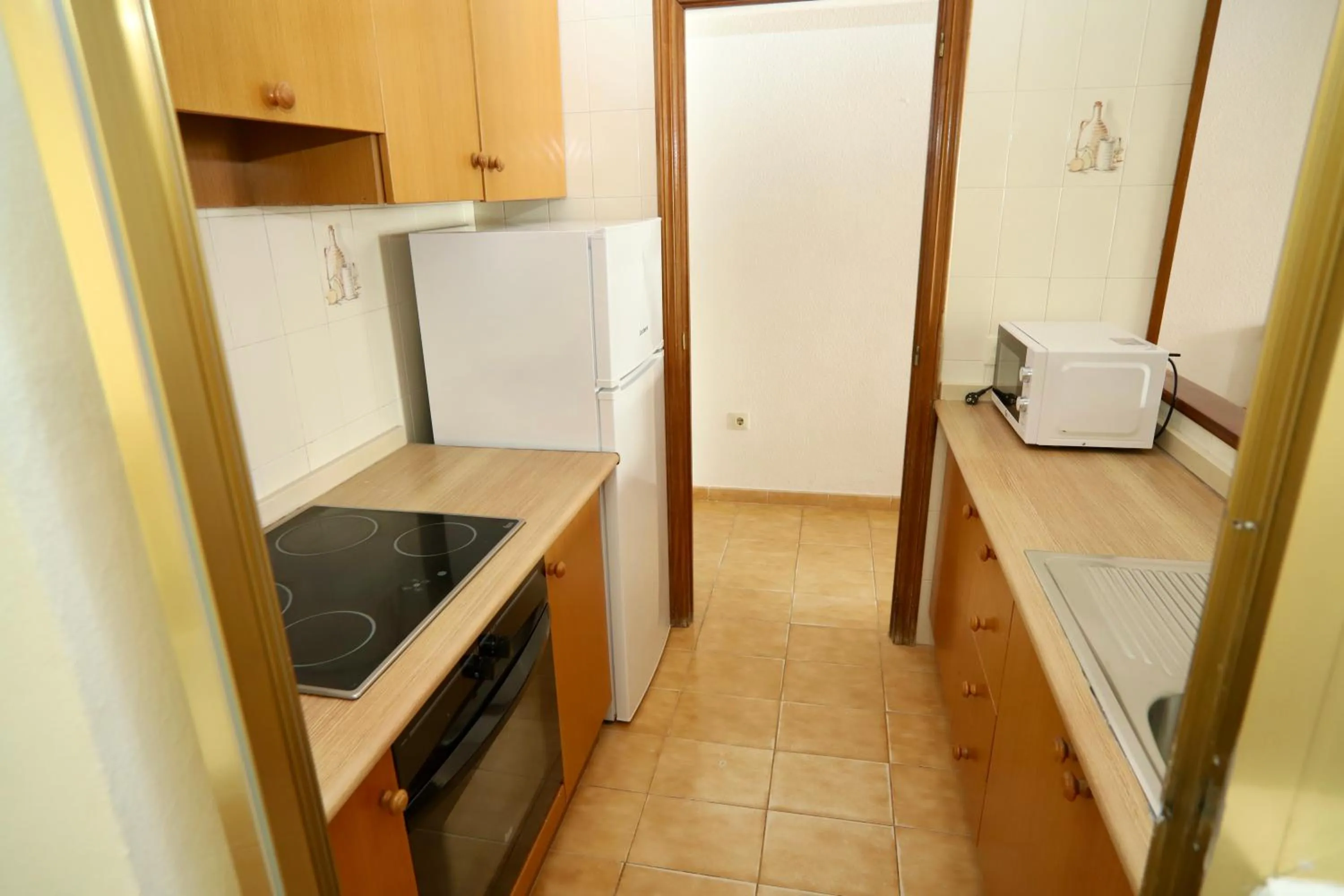 Kitchen or kitchenette in Apartamentos Torre Gerona