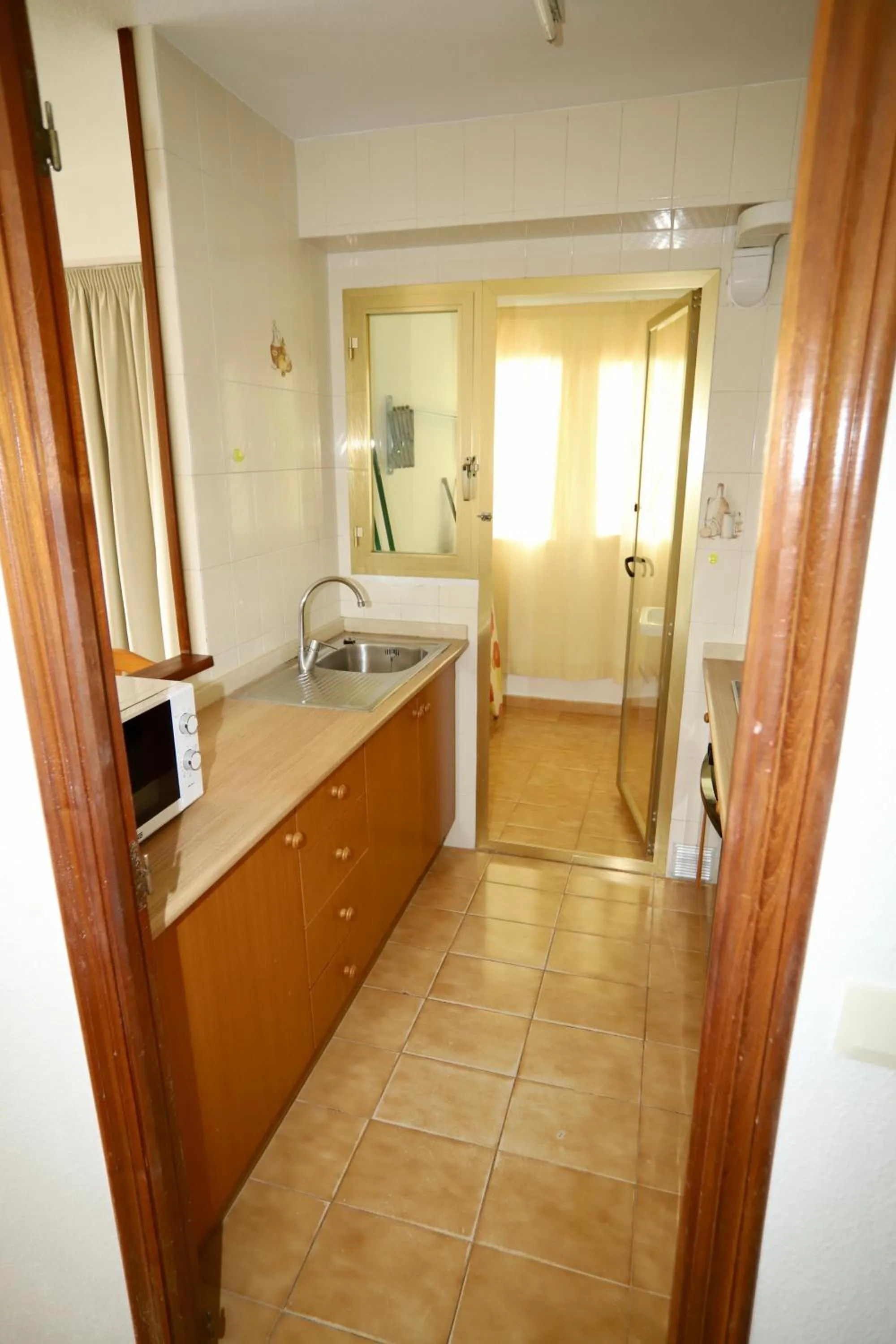 Kitchen or kitchenette in Apartamentos Torre Gerona